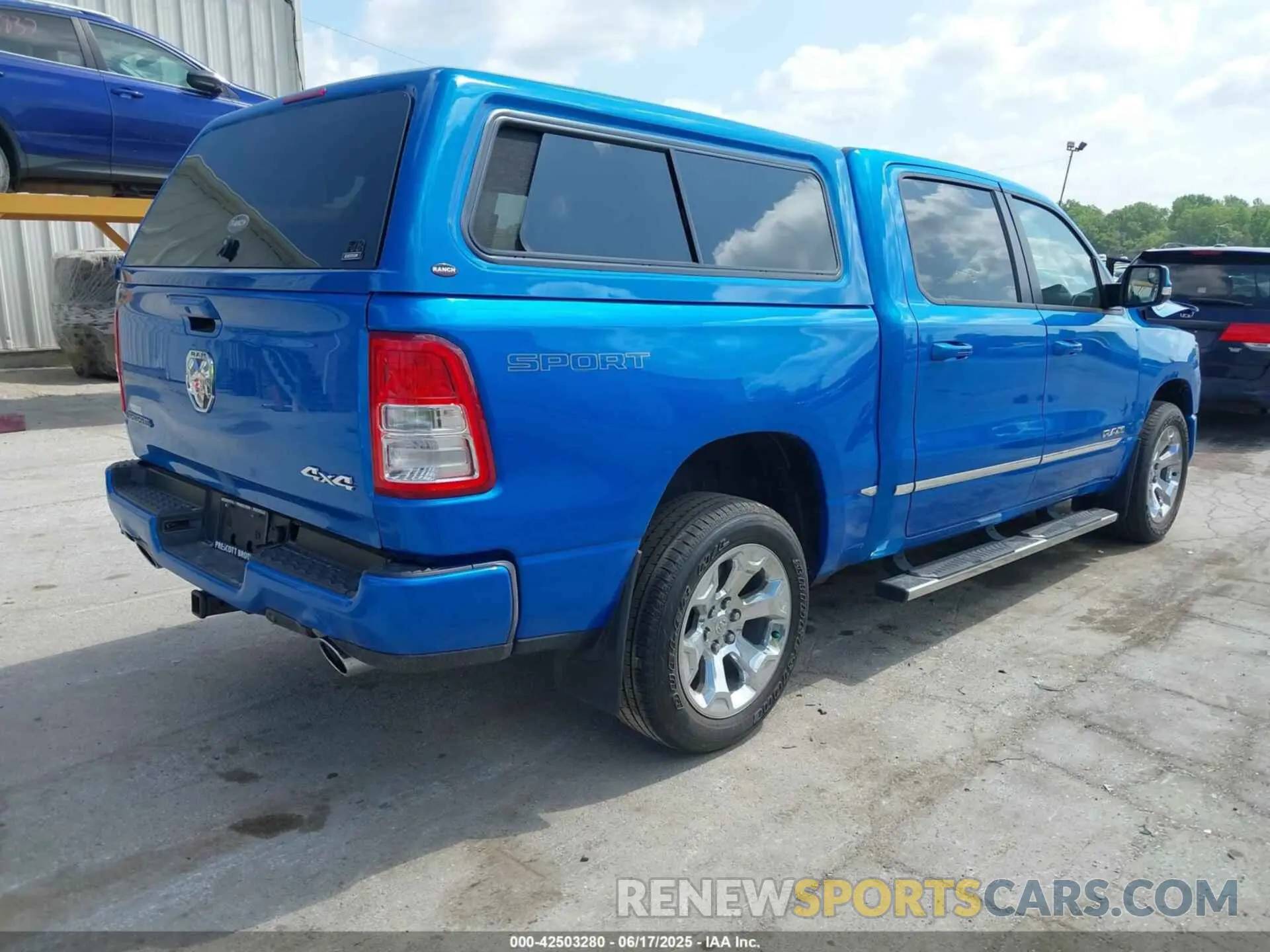 4 Photograph of a damaged car 1C6SRFFT1NN401769 RAM 1500 2022
