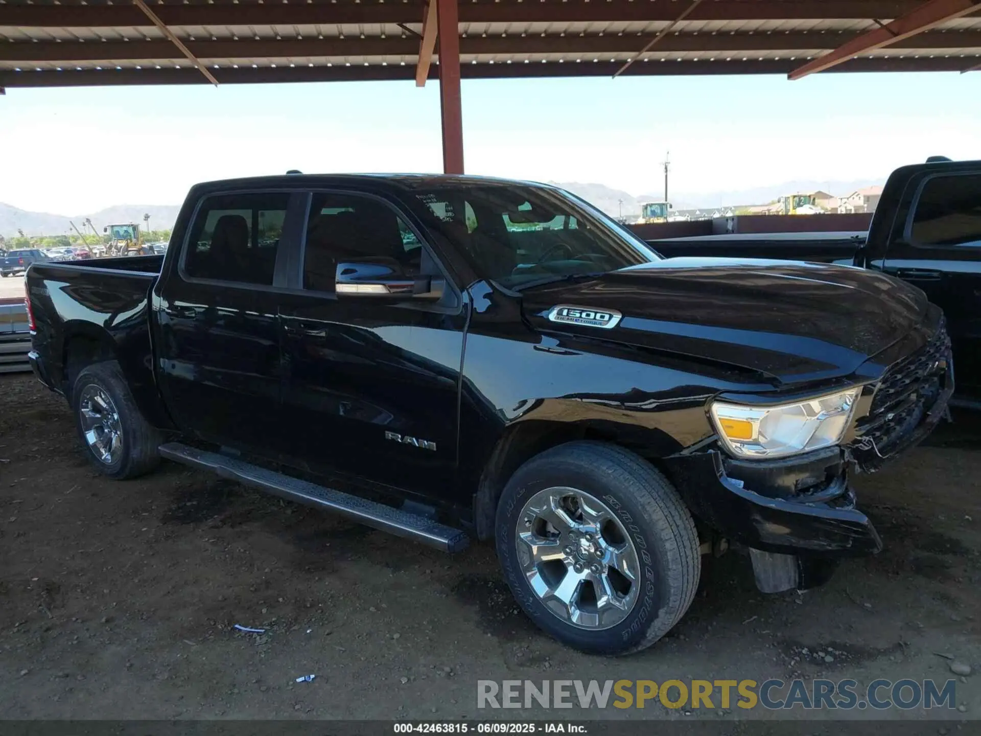 1 Photograph of a damaged car 1C6SRFFT1NN459168 RAM 1500 2022