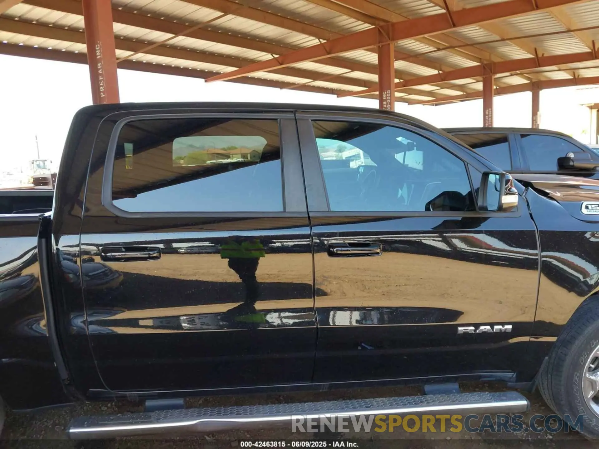 13 Photograph of a damaged car 1C6SRFFT1NN459168 RAM 1500 2022
