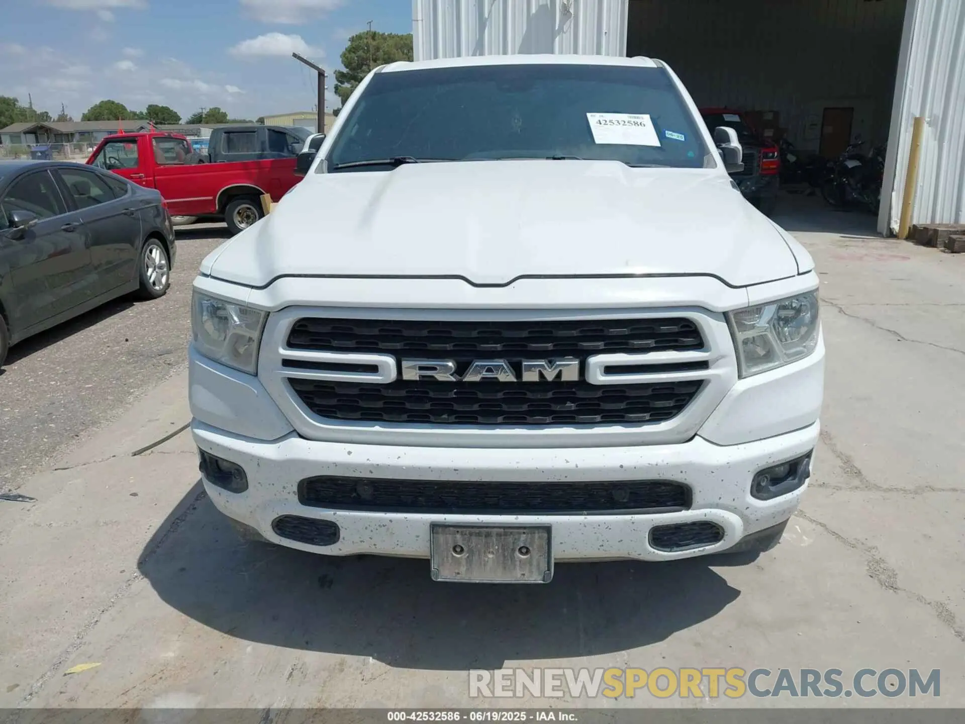 12 Photograph of a damaged car 1C6SRFFT2NN317525 RAM 1500 2022