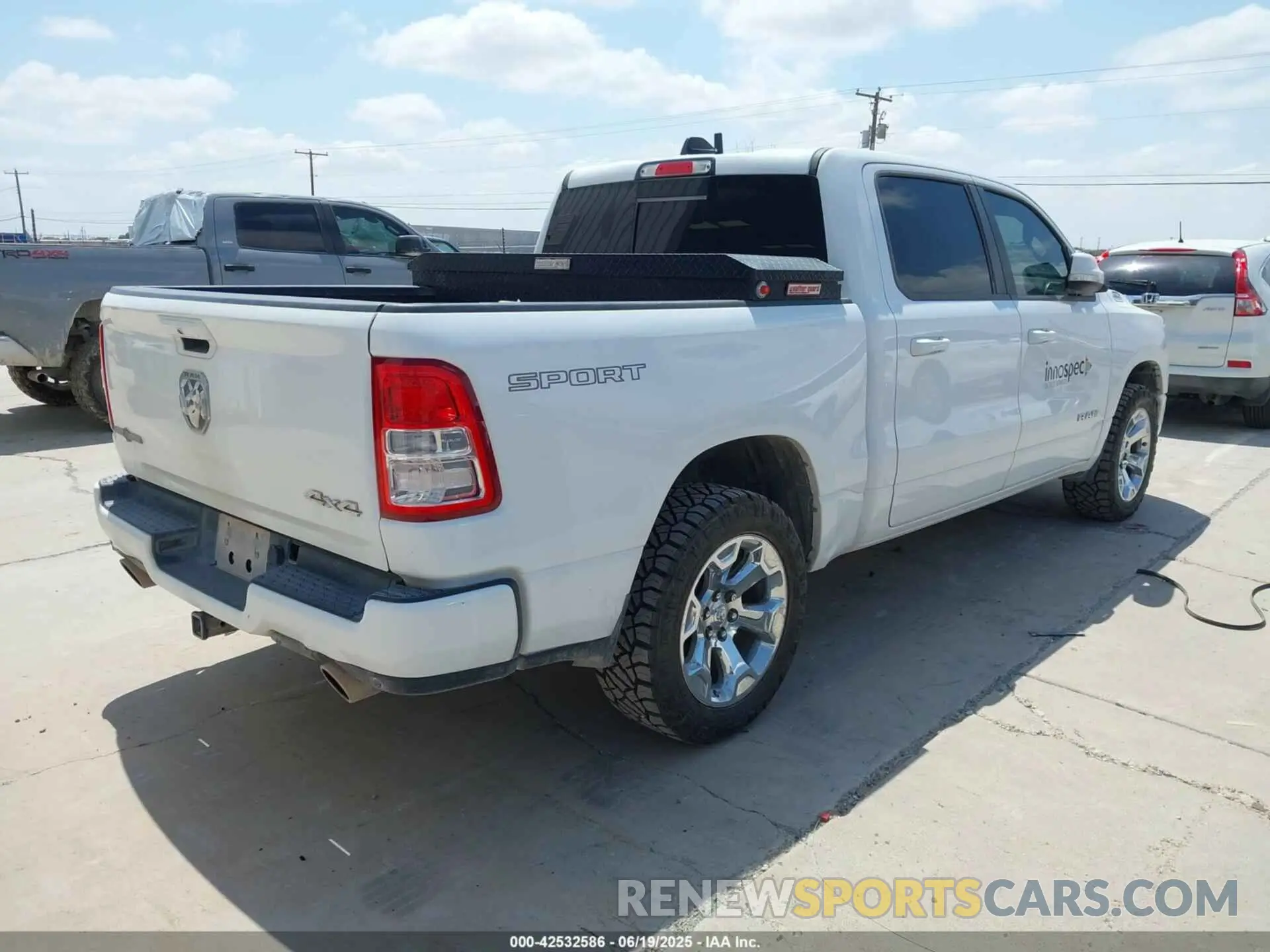4 Photograph of a damaged car 1C6SRFFT2NN317525 RAM 1500 2022