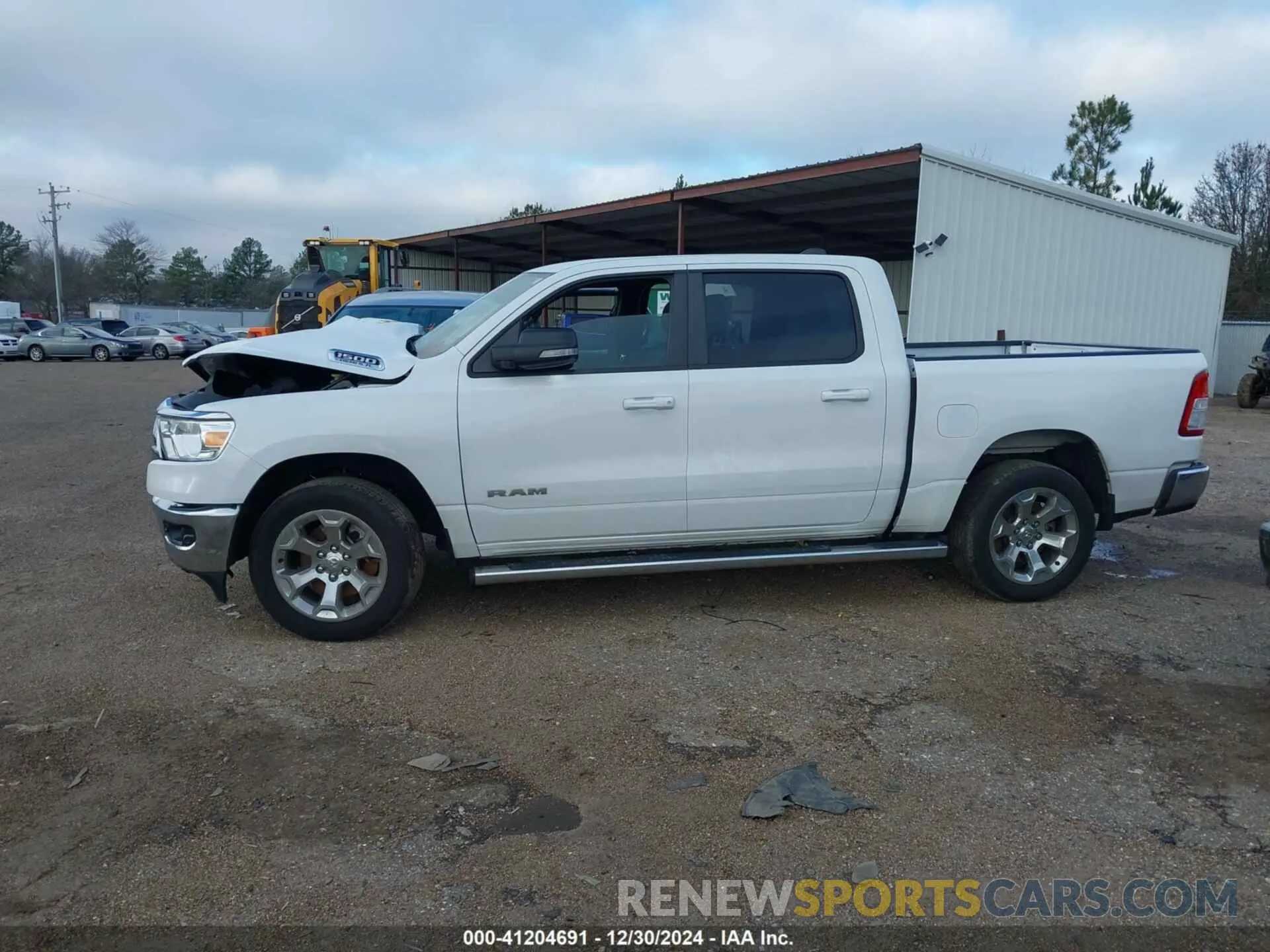14 Photograph of a damaged car 1C6SRFFT2NN320943 RAM 1500 2022