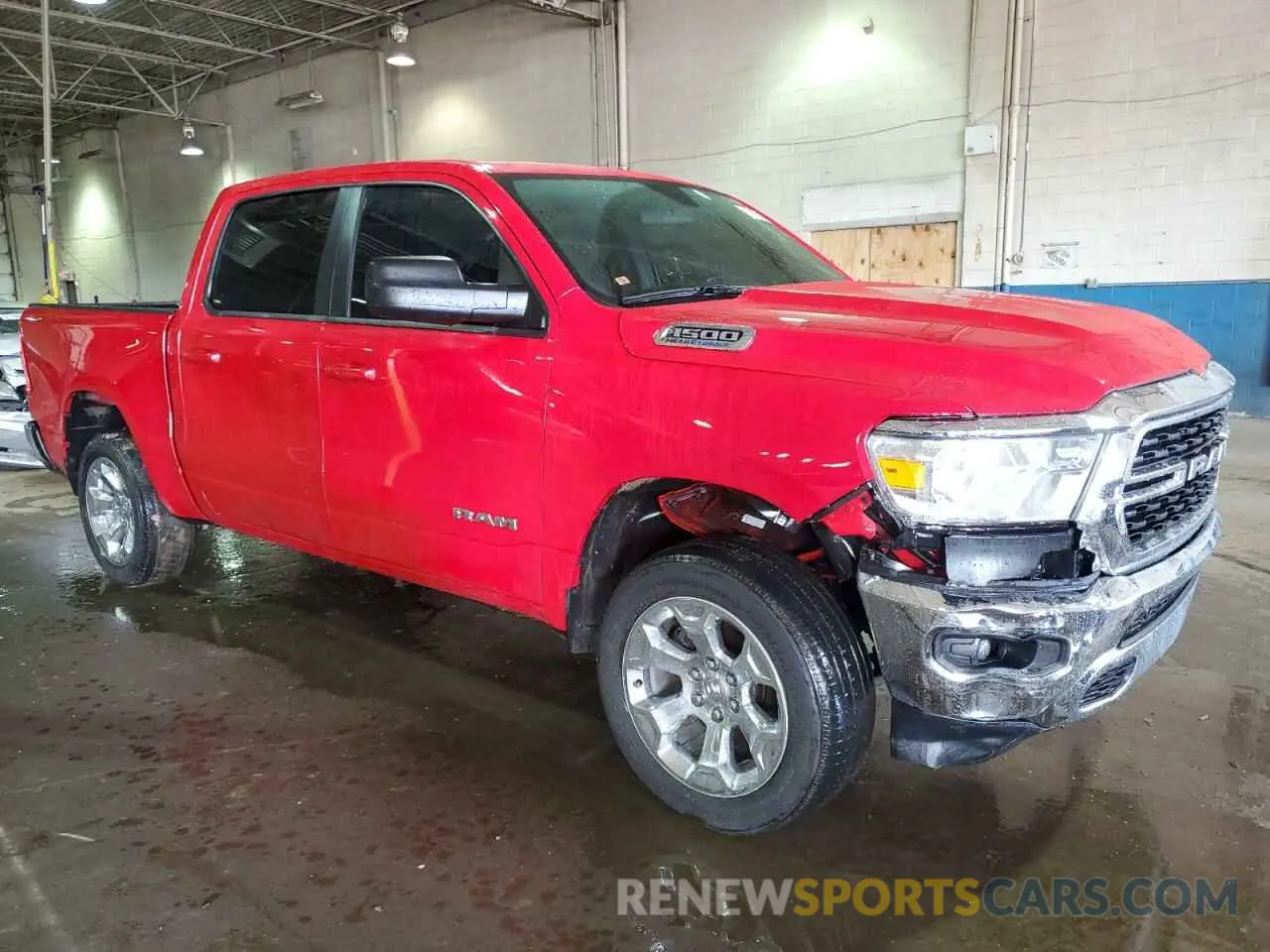 4 Photograph of a damaged car 1C6SRFFT2NN352811 RAM 1500 2022