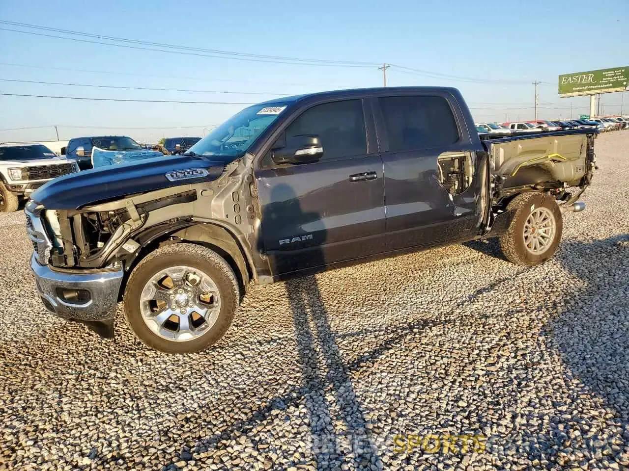 1 Photograph of a damaged car 1C6SRFFT2NN380723 RAM 1500 2022