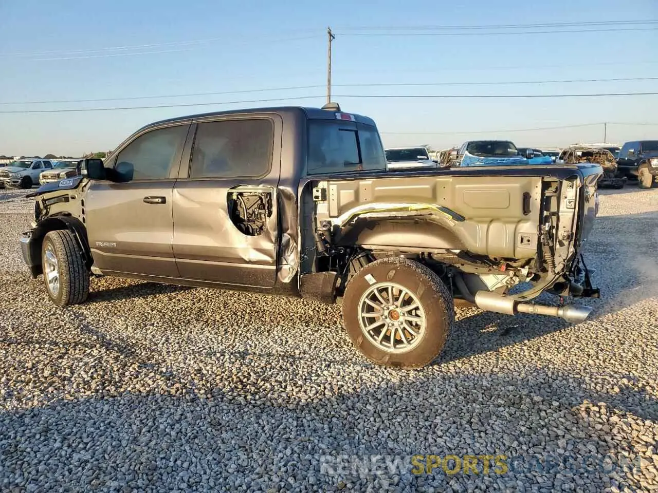 2 Photograph of a damaged car 1C6SRFFT2NN380723 RAM 1500 2022