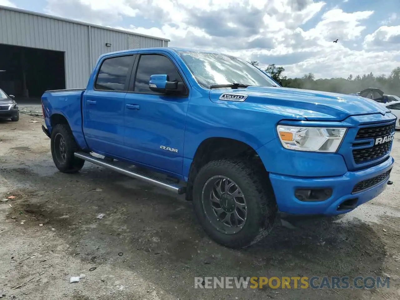 4 Photograph of a damaged car 1C6SRFFT2NN413087 RAM 1500 2022