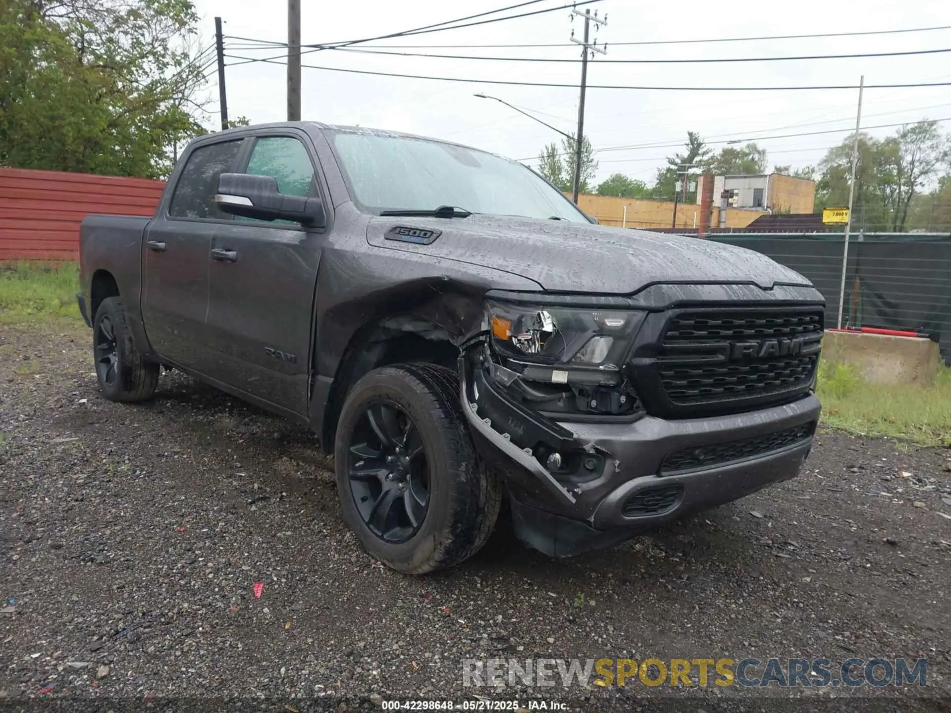 1 Photograph of a damaged car 1C6SRFFT3NN148096 RAM 1500 2022