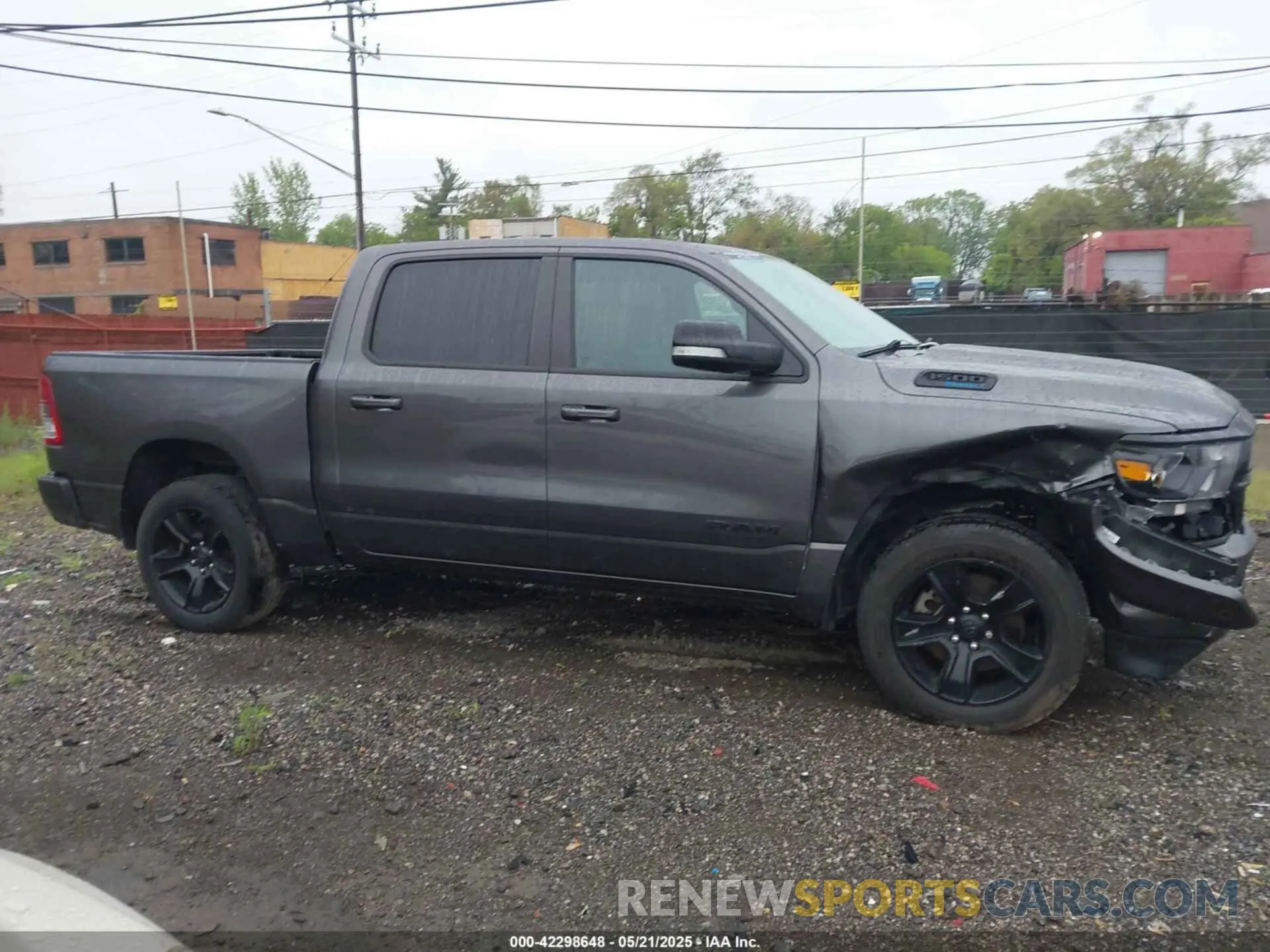 13 Photograph of a damaged car 1C6SRFFT3NN148096 RAM 1500 2022