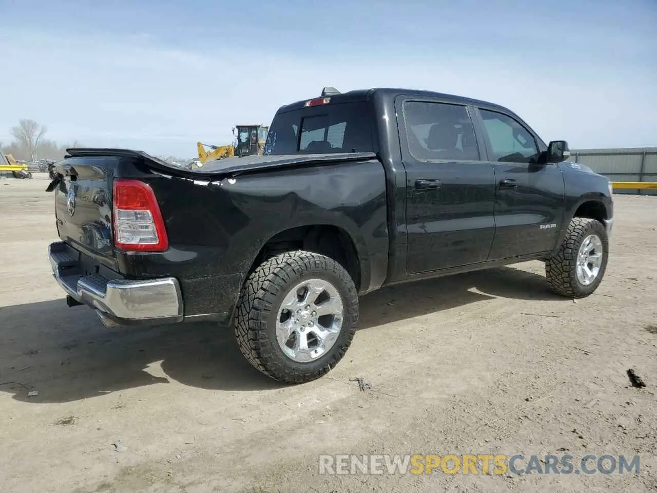 3 Photograph of a damaged car 1C6SRFFT3NN400655 RAM 1500 2022