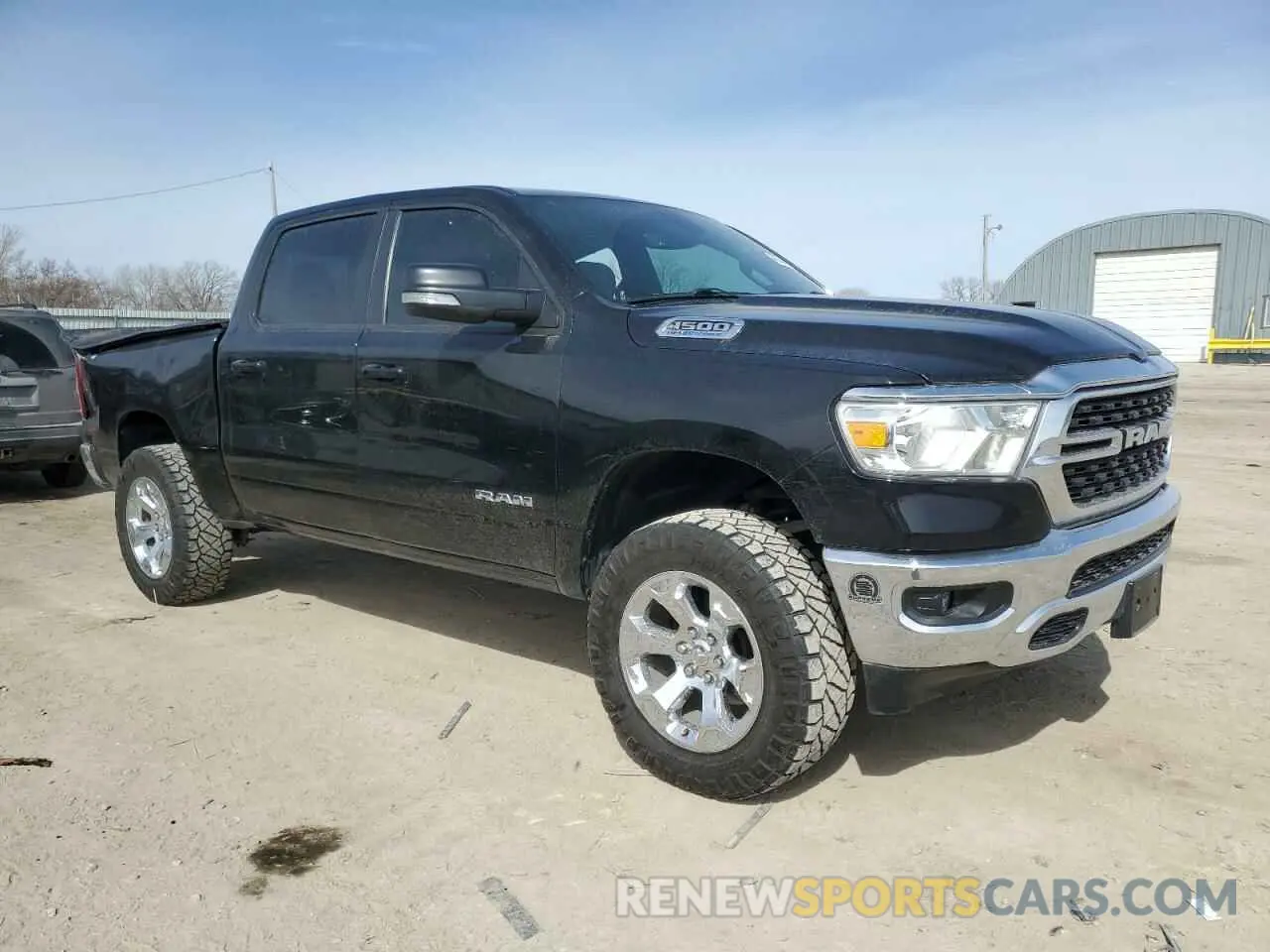 4 Photograph of a damaged car 1C6SRFFT3NN400655 RAM 1500 2022