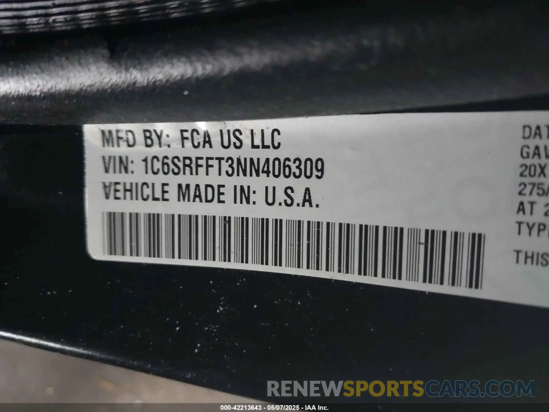 9 Photograph of a damaged car 1C6SRFFT3NN406309 RAM 1500 2022