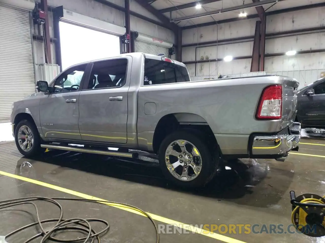 2 Photograph of a damaged car 1C6SRFFT3NN411980 RAM 1500 2022