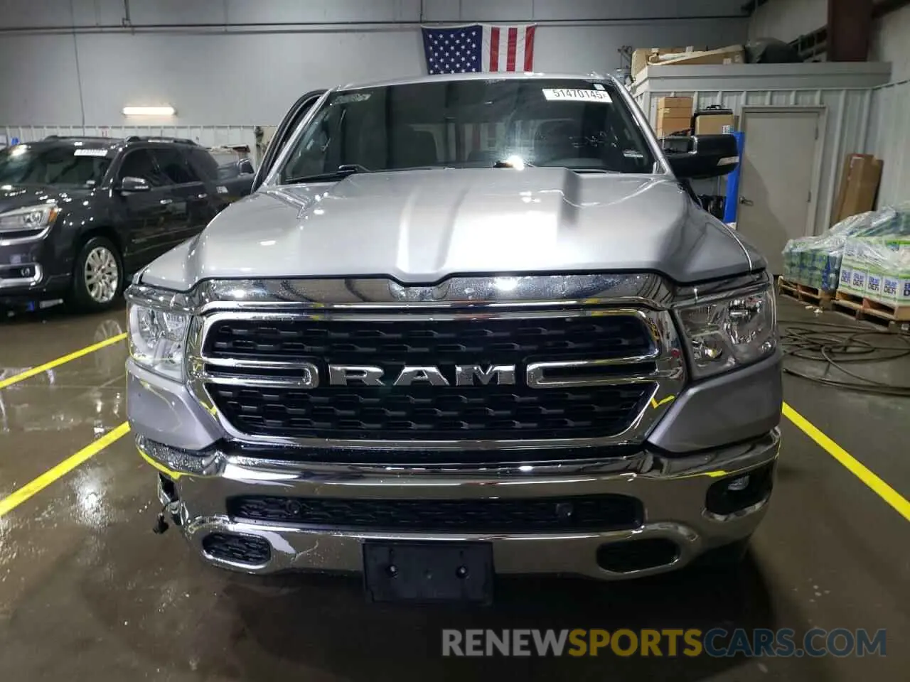 5 Photograph of a damaged car 1C6SRFFT3NN411980 RAM 1500 2022