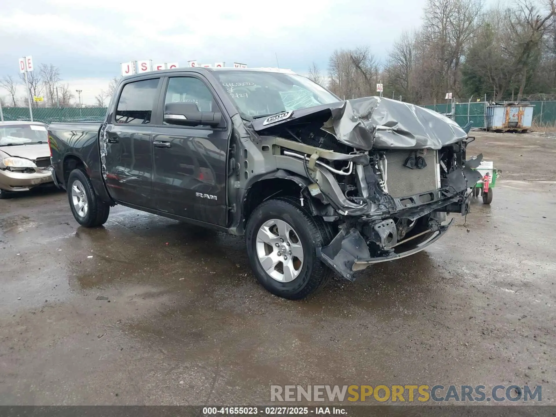 1 Photograph of a damaged car 1C6SRFFT4NN158961 RAM 1500 2022