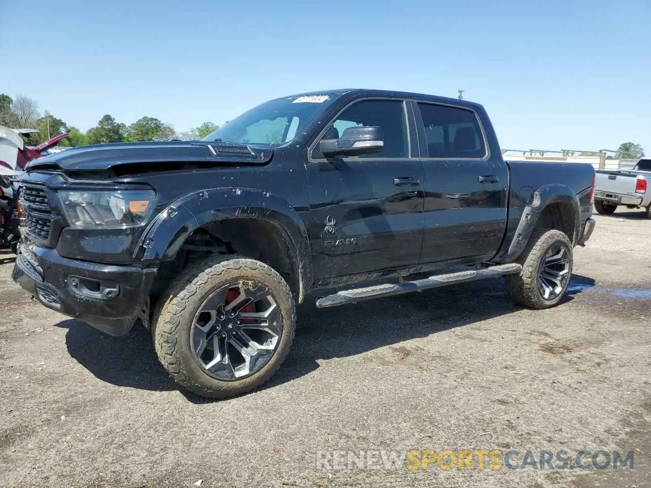 1 Photograph of a damaged car 1C6SRFFT4NN330955 RAM 1500 2022