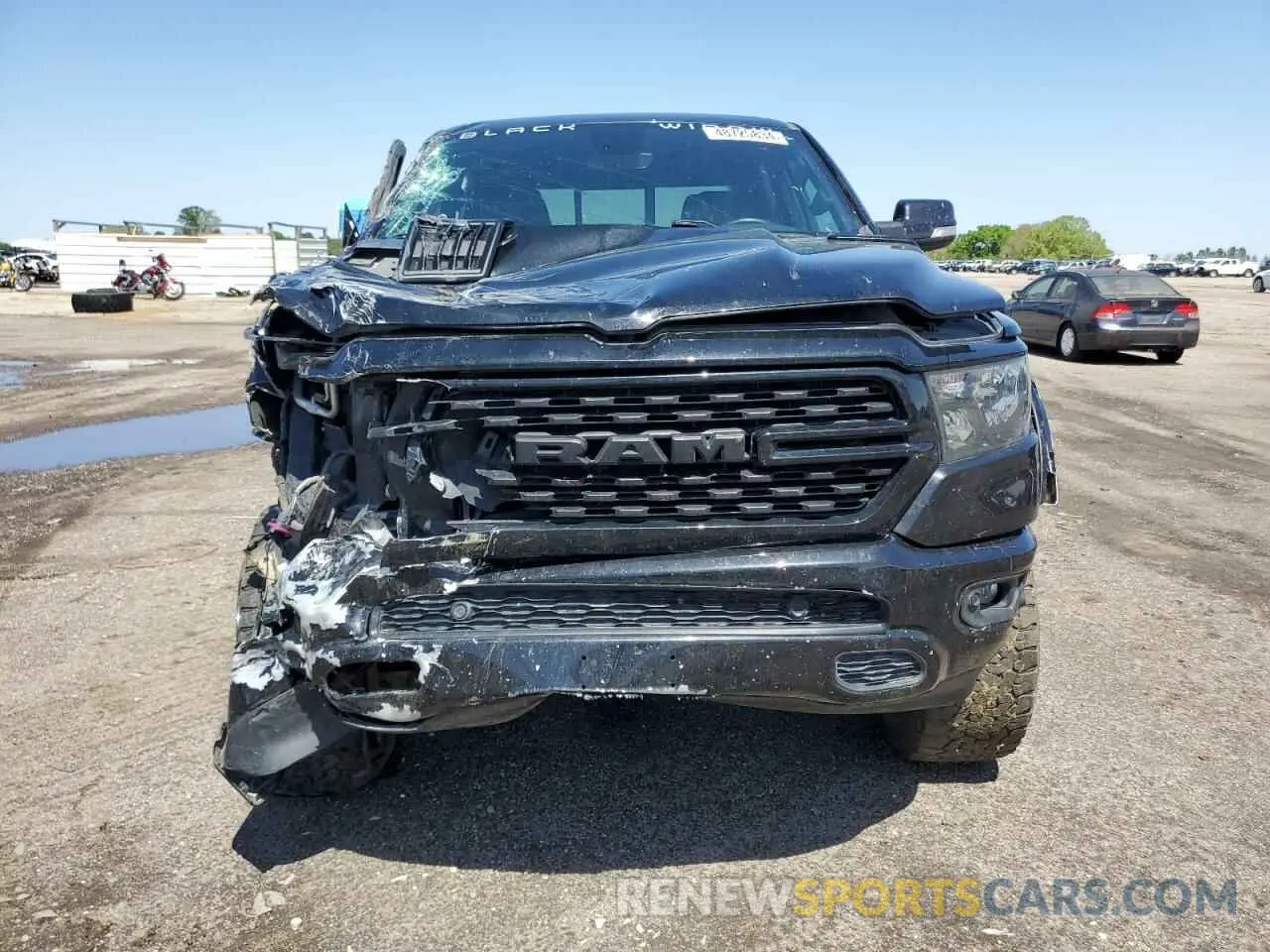 5 Photograph of a damaged car 1C6SRFFT4NN330955 RAM 1500 2022