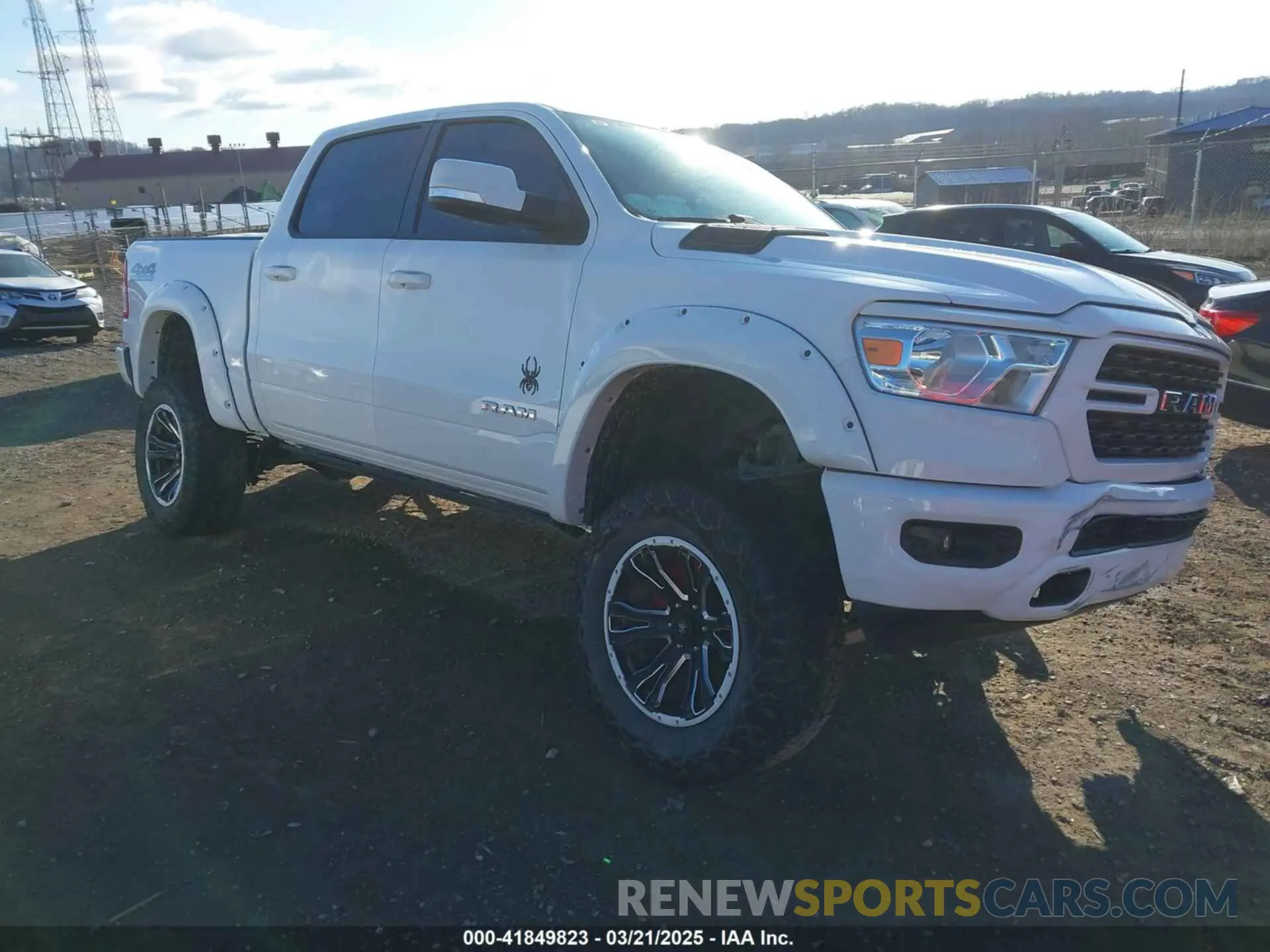 1 Photograph of a damaged car 1C6SRFFT4NN428657 RAM 1500 2022