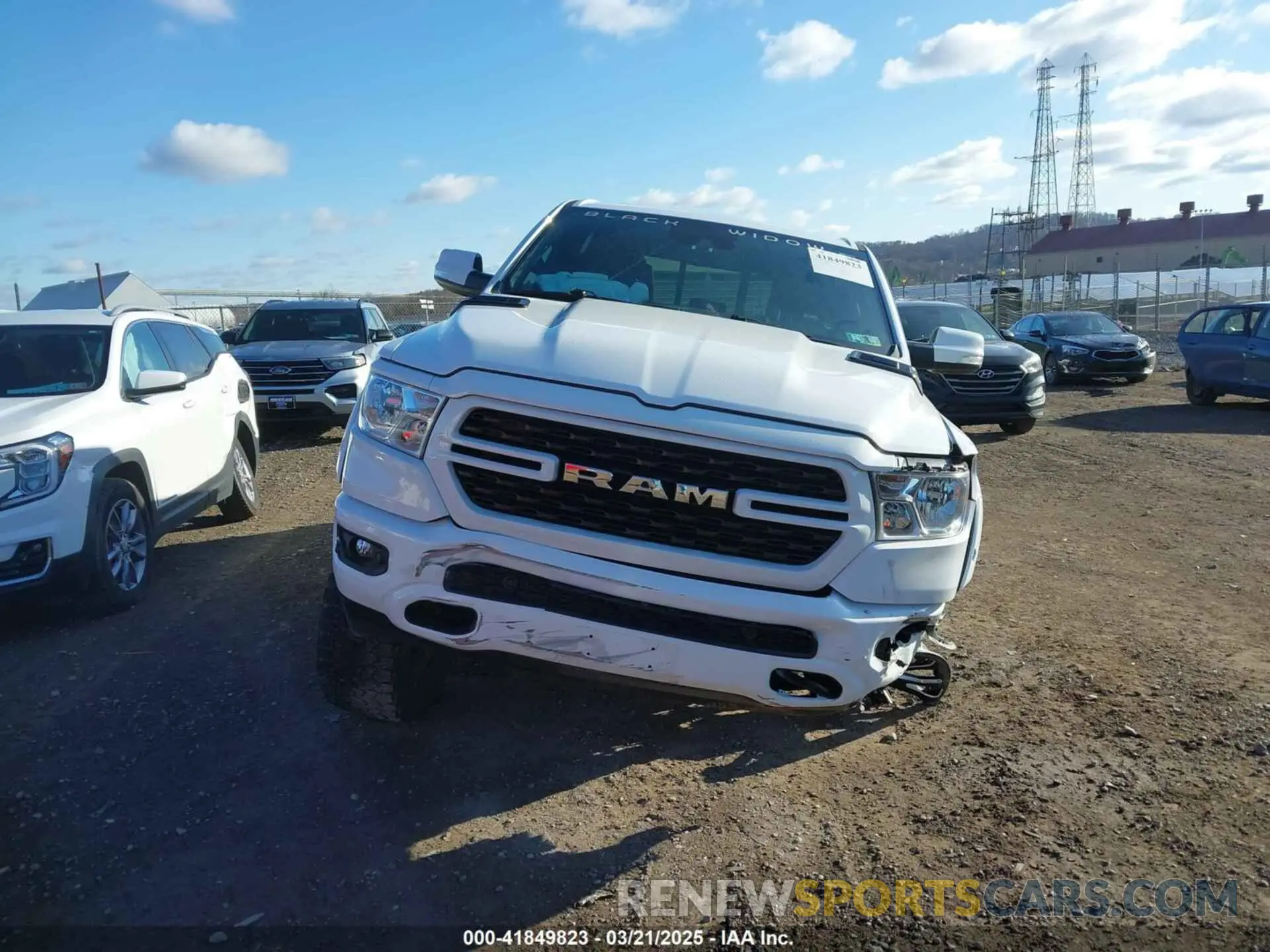 13 Photograph of a damaged car 1C6SRFFT4NN428657 RAM 1500 2022