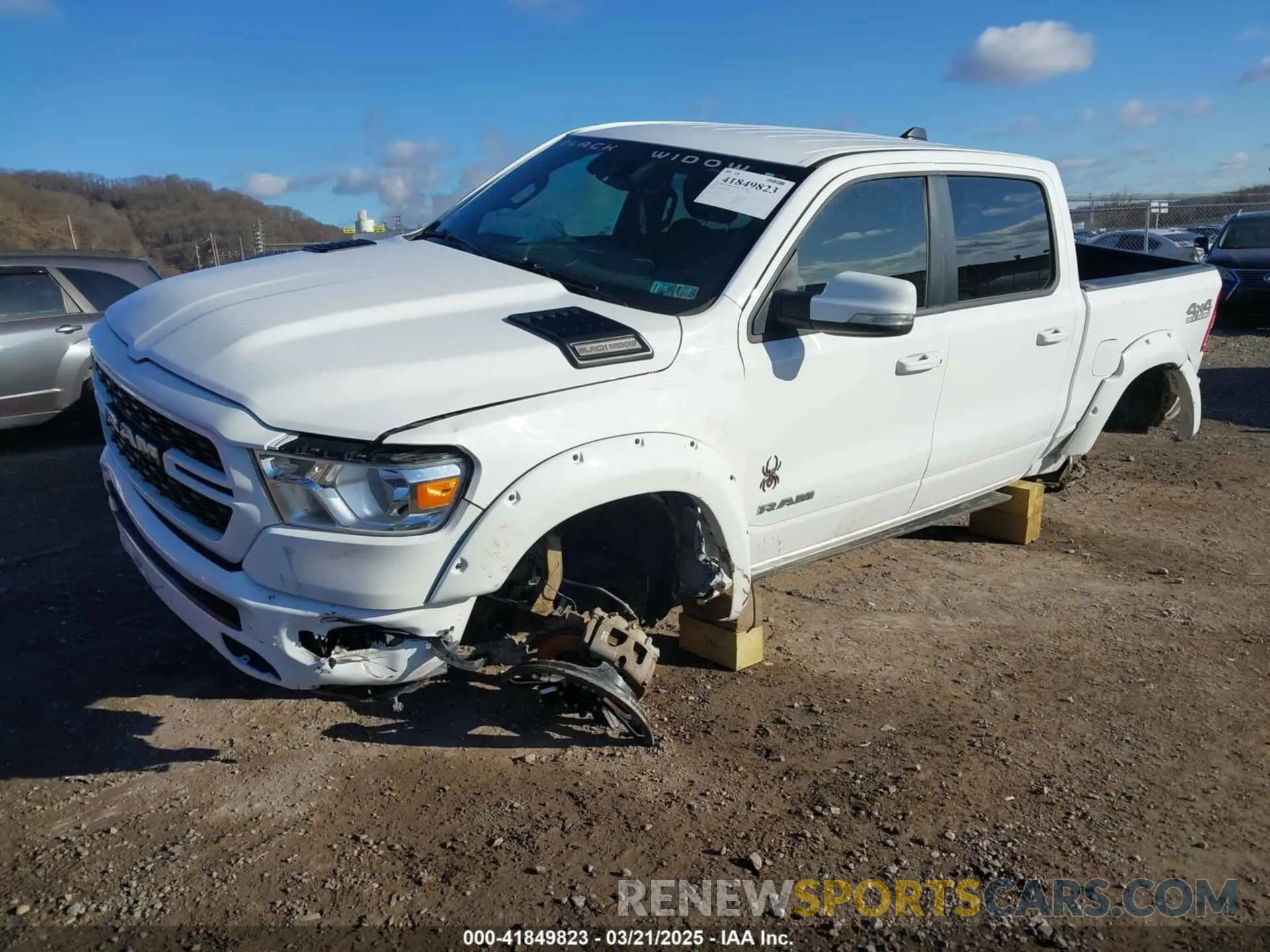 2 Photograph of a damaged car 1C6SRFFT4NN428657 RAM 1500 2022