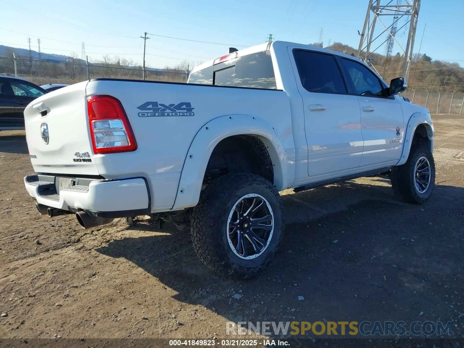 4 Photograph of a damaged car 1C6SRFFT4NN428657 RAM 1500 2022