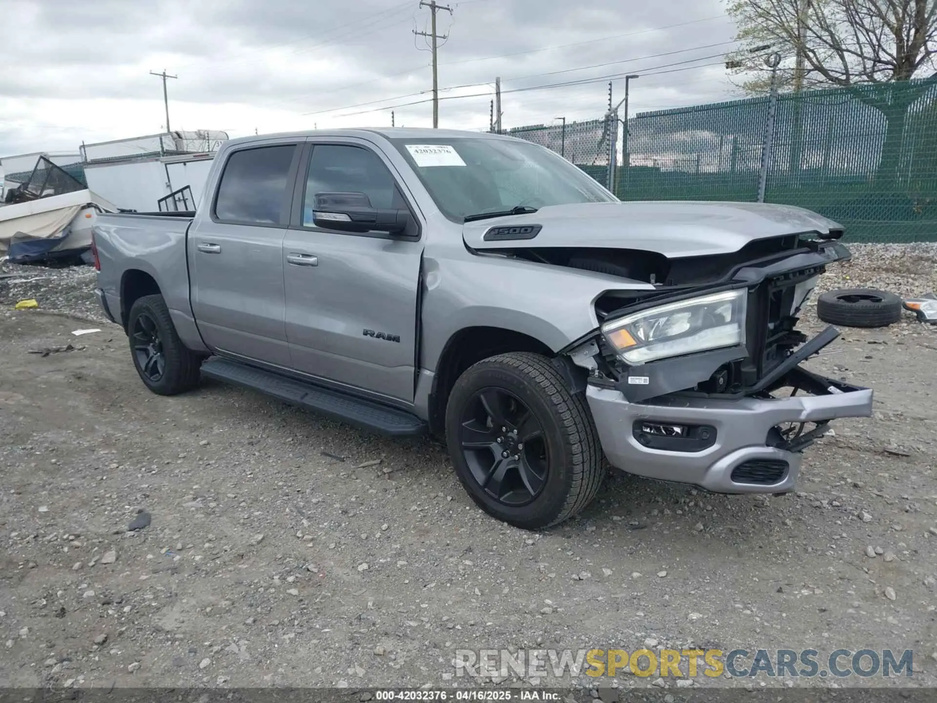 1 Photograph of a damaged car 1C6SRFFT5NN280759 RAM 1500 2022