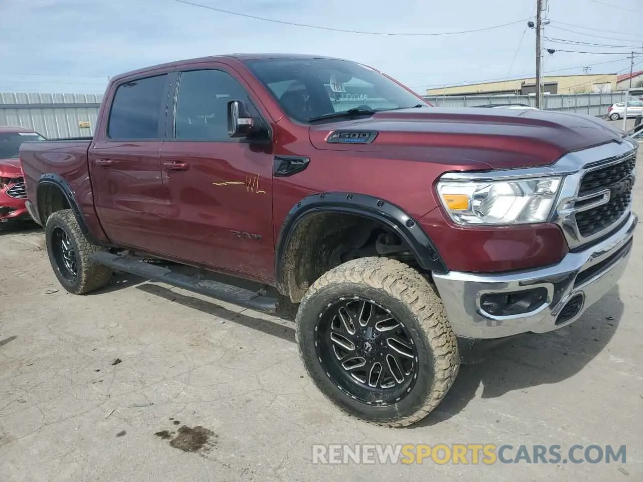 4 Photograph of a damaged car 1C6SRFFT5NN284651 RAM 1500 2022