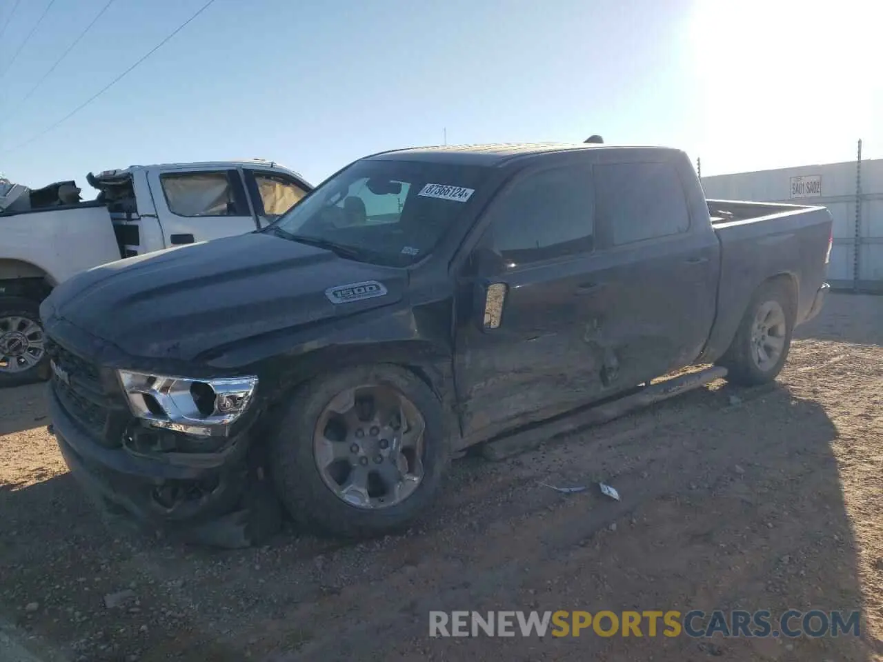 1 Photograph of a damaged car 1C6SRFFT5NN478001 RAM 1500 2022