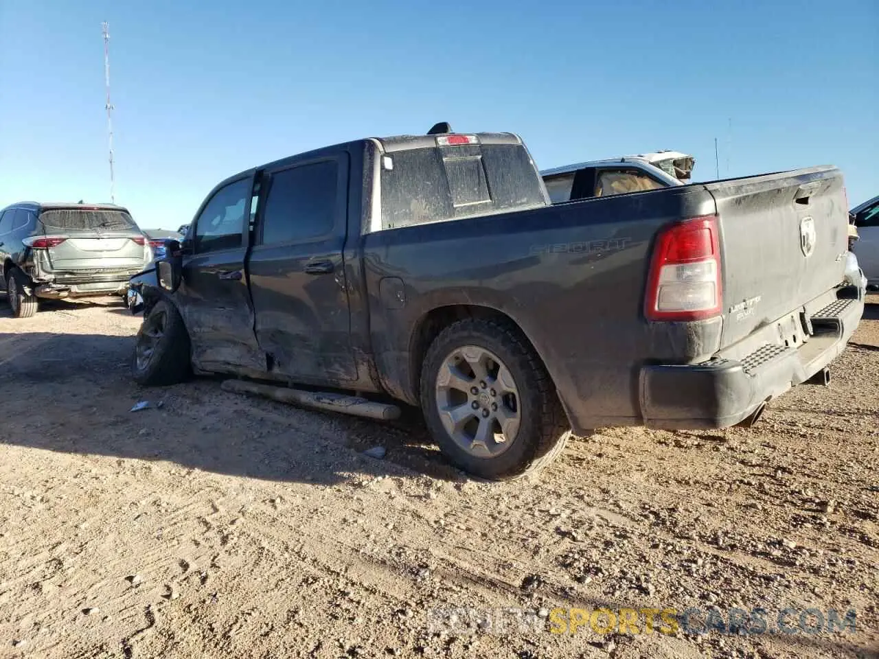 2 Photograph of a damaged car 1C6SRFFT5NN478001 RAM 1500 2022