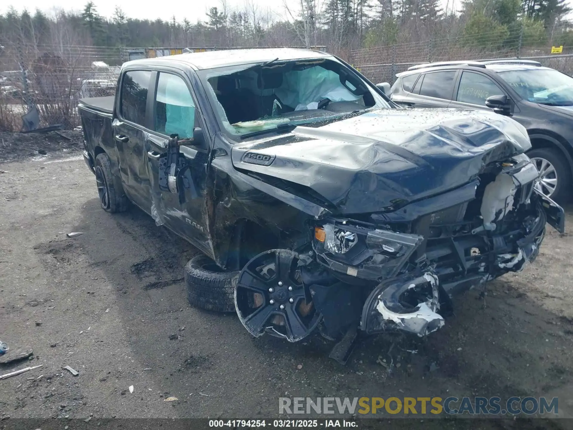1 Photograph of a damaged car 1C6SRFFT6NN238679 RAM 1500 2022