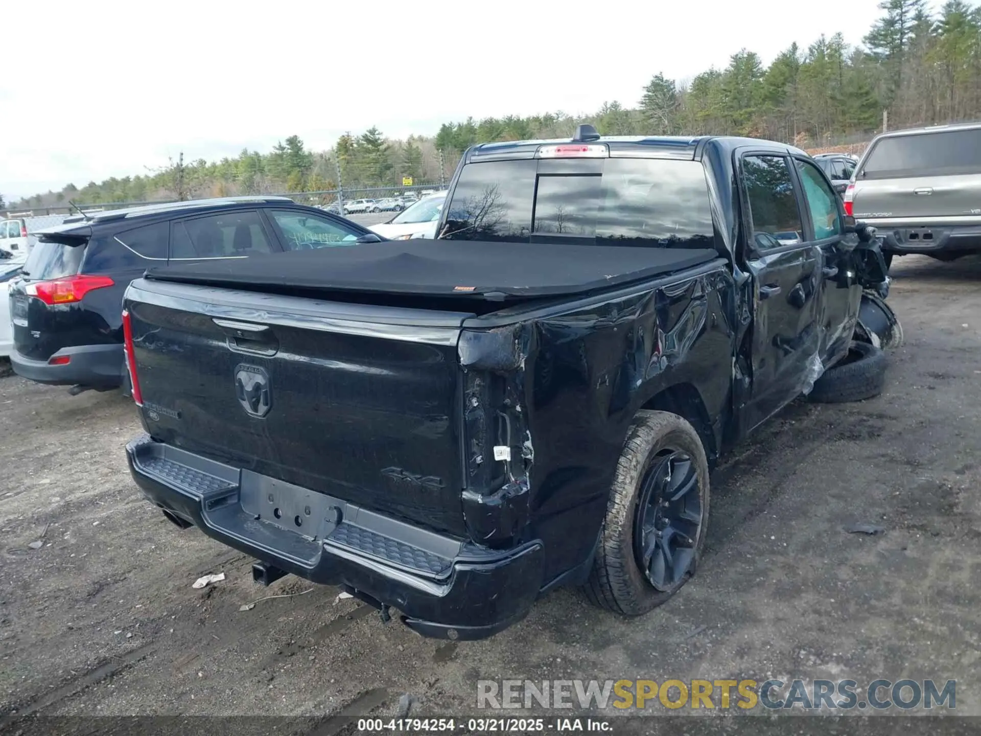 4 Photograph of a damaged car 1C6SRFFT6NN238679 RAM 1500 2022