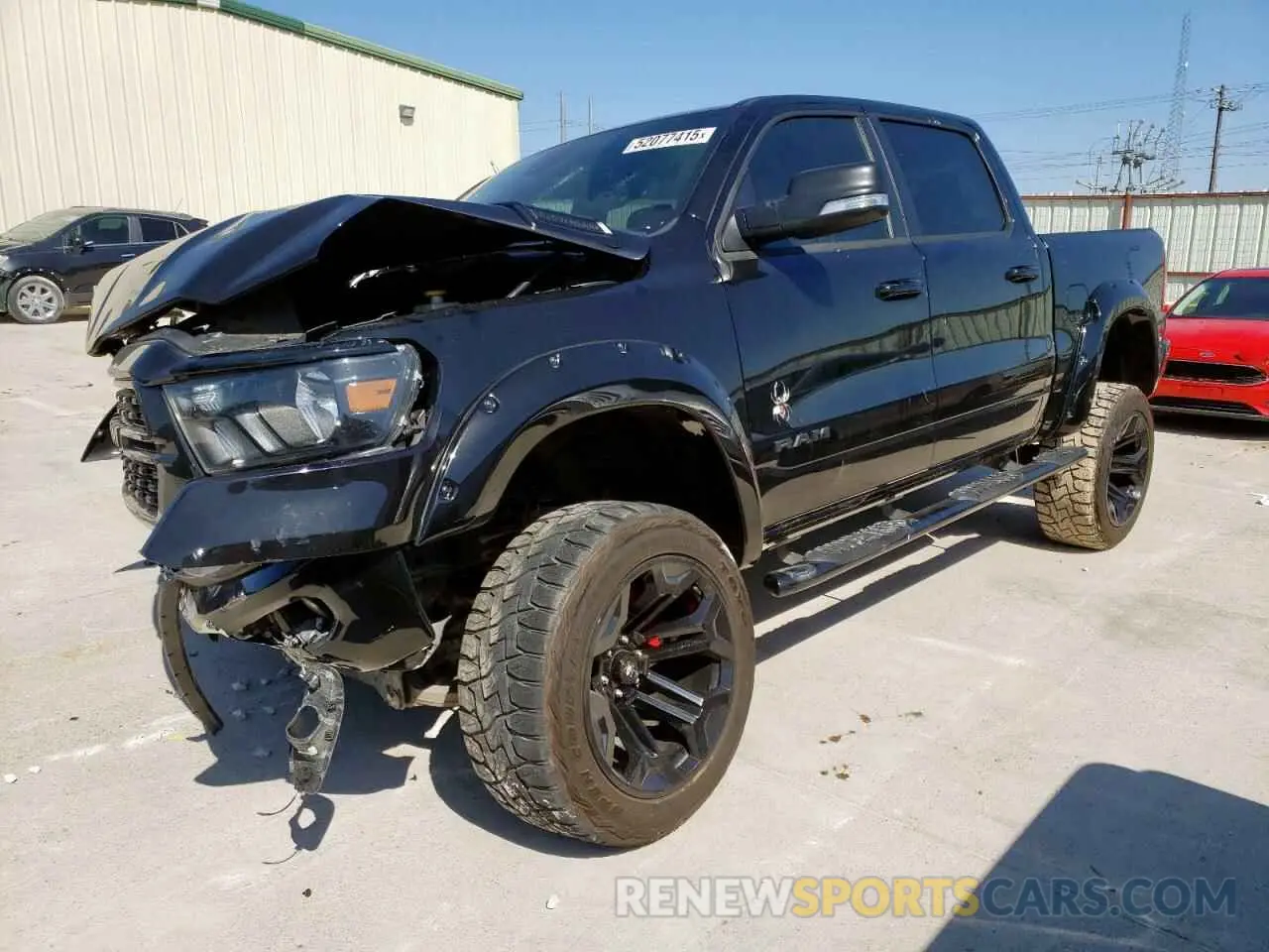 1 Photograph of a damaged car 1C6SRFFT7NN236617 RAM 1500 2022