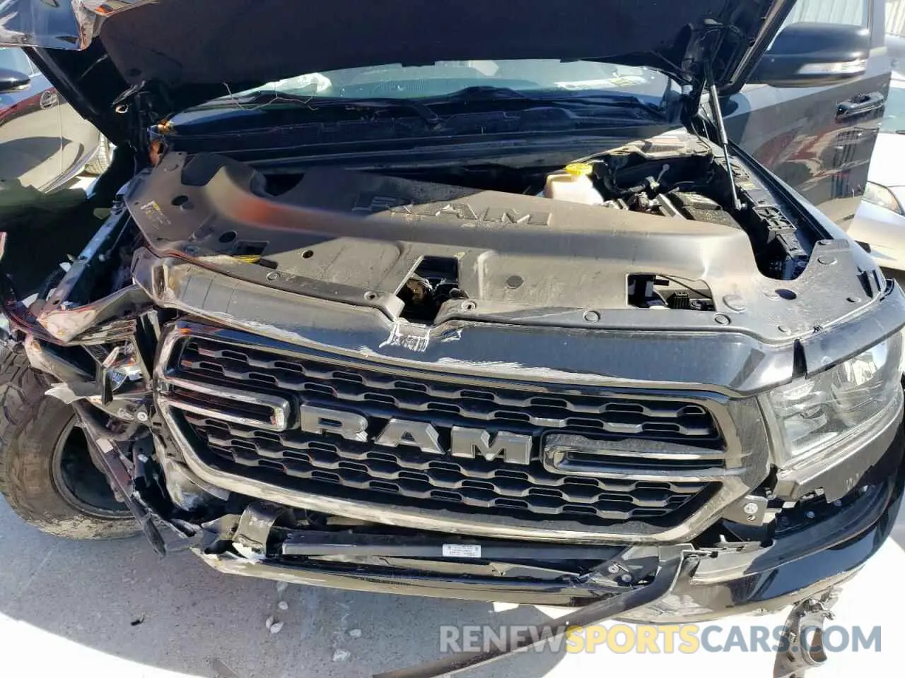 11 Photograph of a damaged car 1C6SRFFT7NN236617 RAM 1500 2022