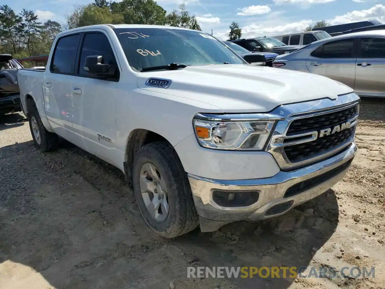 4 Photograph of a damaged car 1C6SRFFT7NN242272 RAM 1500 2022