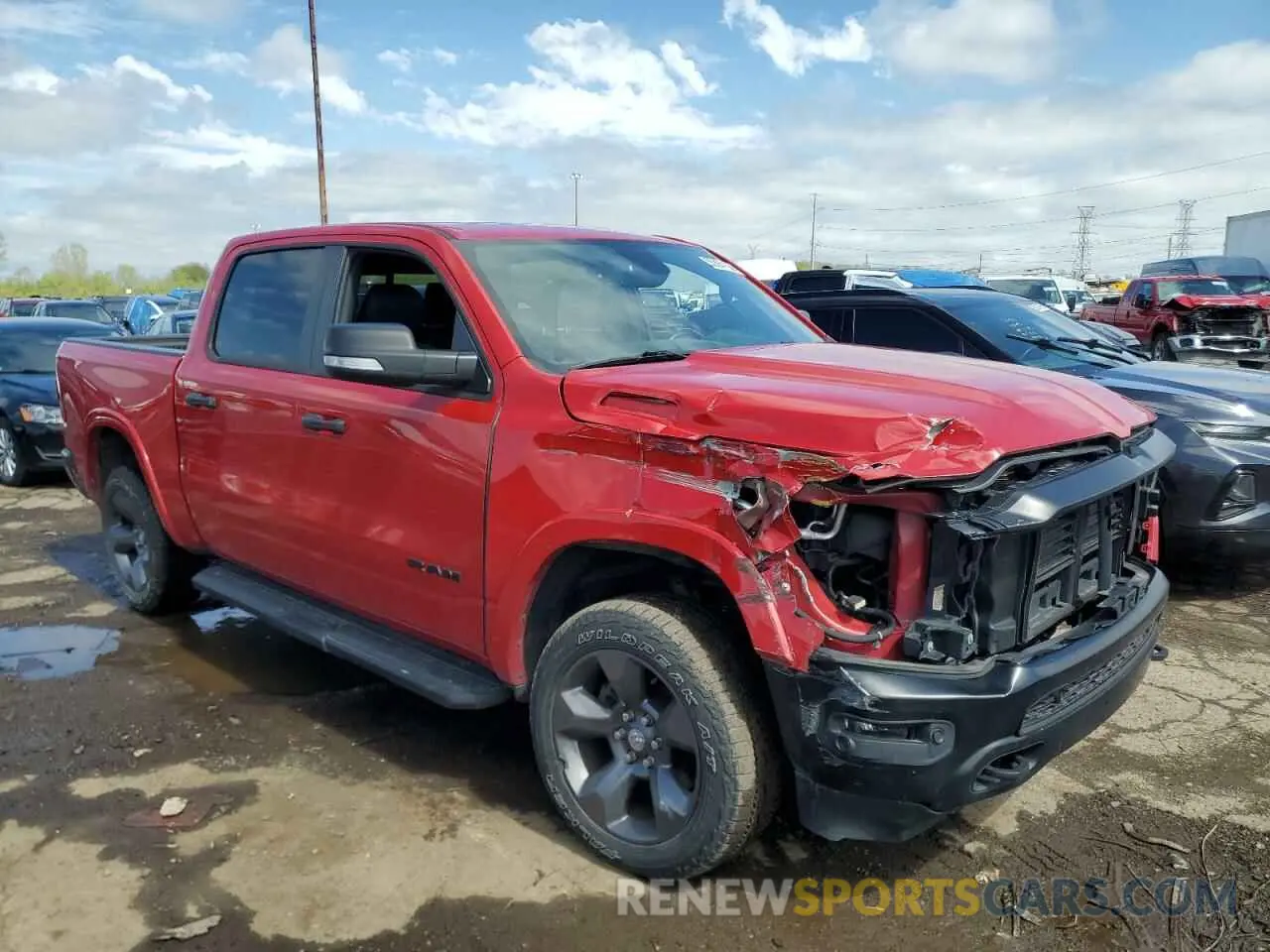4 Photograph of a damaged car 1C6SRFFT7NN242837 RAM 1500 2022