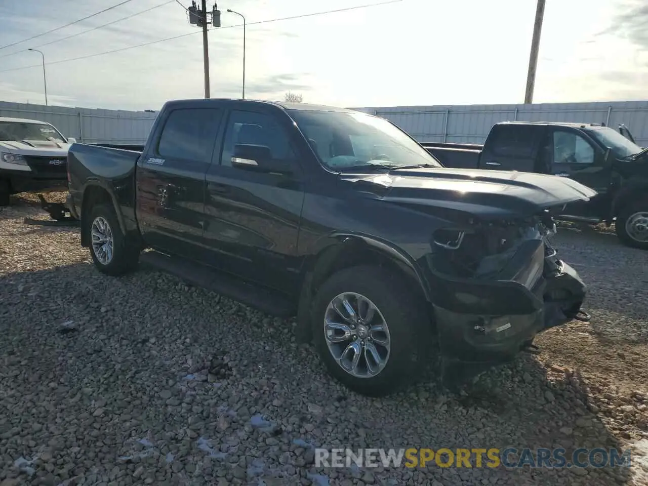 4 Photograph of a damaged car 1C6SRFFT7NN246676 RAM 1500 2022