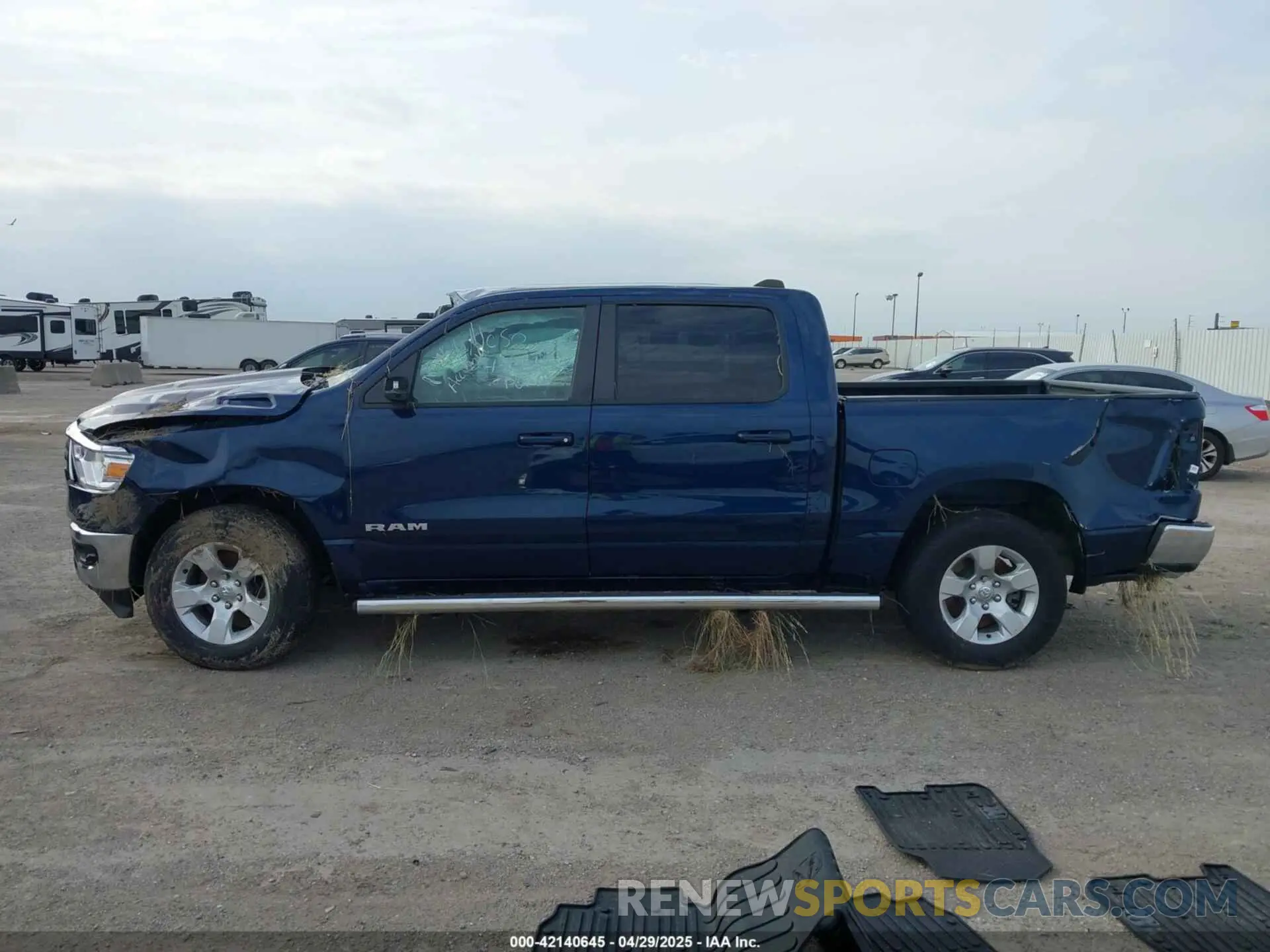 13 Photograph of a damaged car 1C6SRFFT7NN415143 RAM 1500 2022