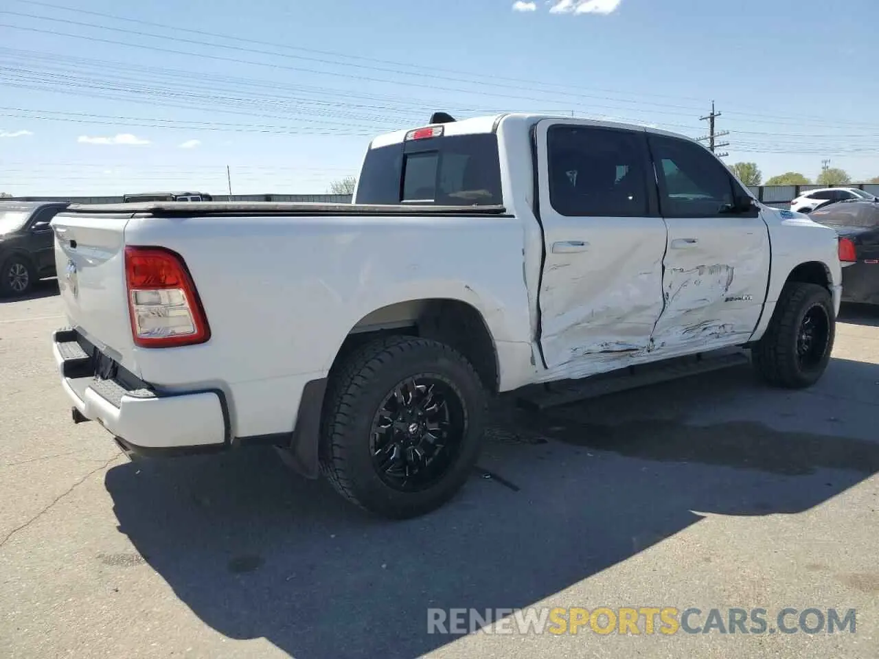 3 Photograph of a damaged car 1C6SRFFT7NN429379 RAM 1500 2022