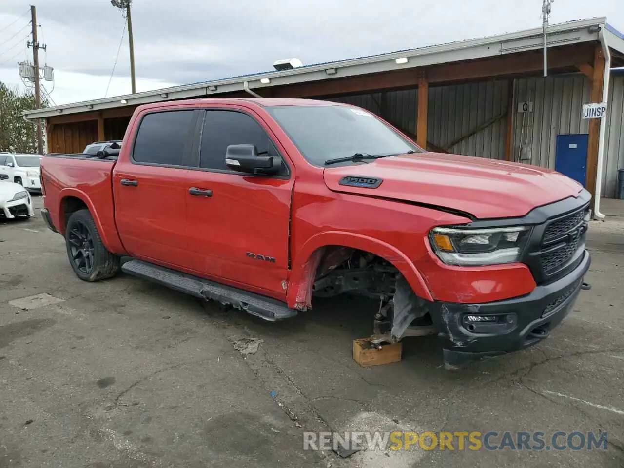 4 Photograph of a damaged car 1C6SRFFT9NN250776 RAM 1500 2022