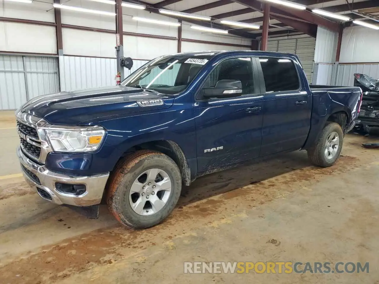 1 Photograph of a damaged car 1C6SRFFTXNN130677 RAM 1500 2022