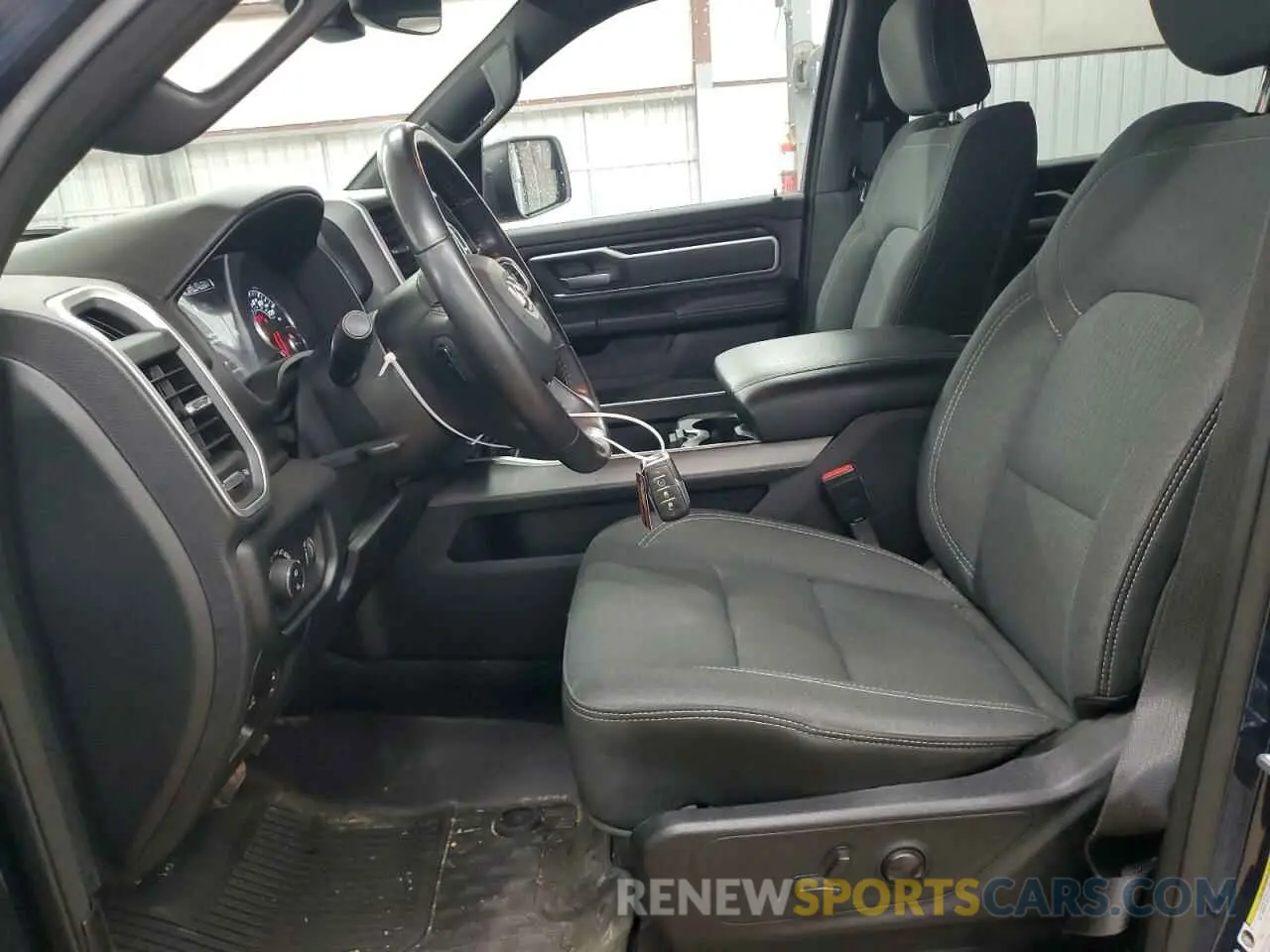7 Photograph of a damaged car 1C6SRFFTXNN130677 RAM 1500 2022