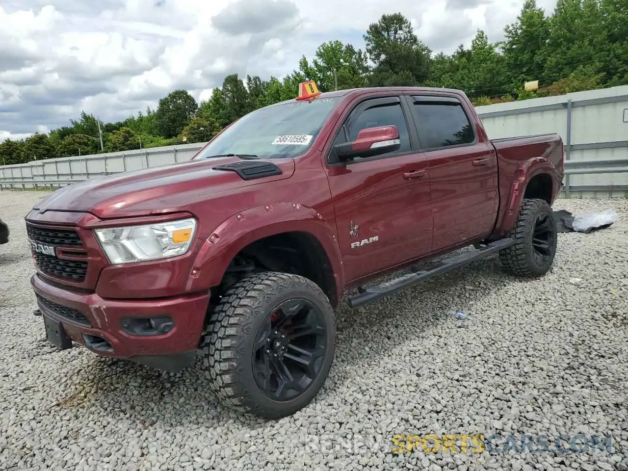 1 Photograph of a damaged car 1C6SRFFTXNN136513 RAM 1500 2022