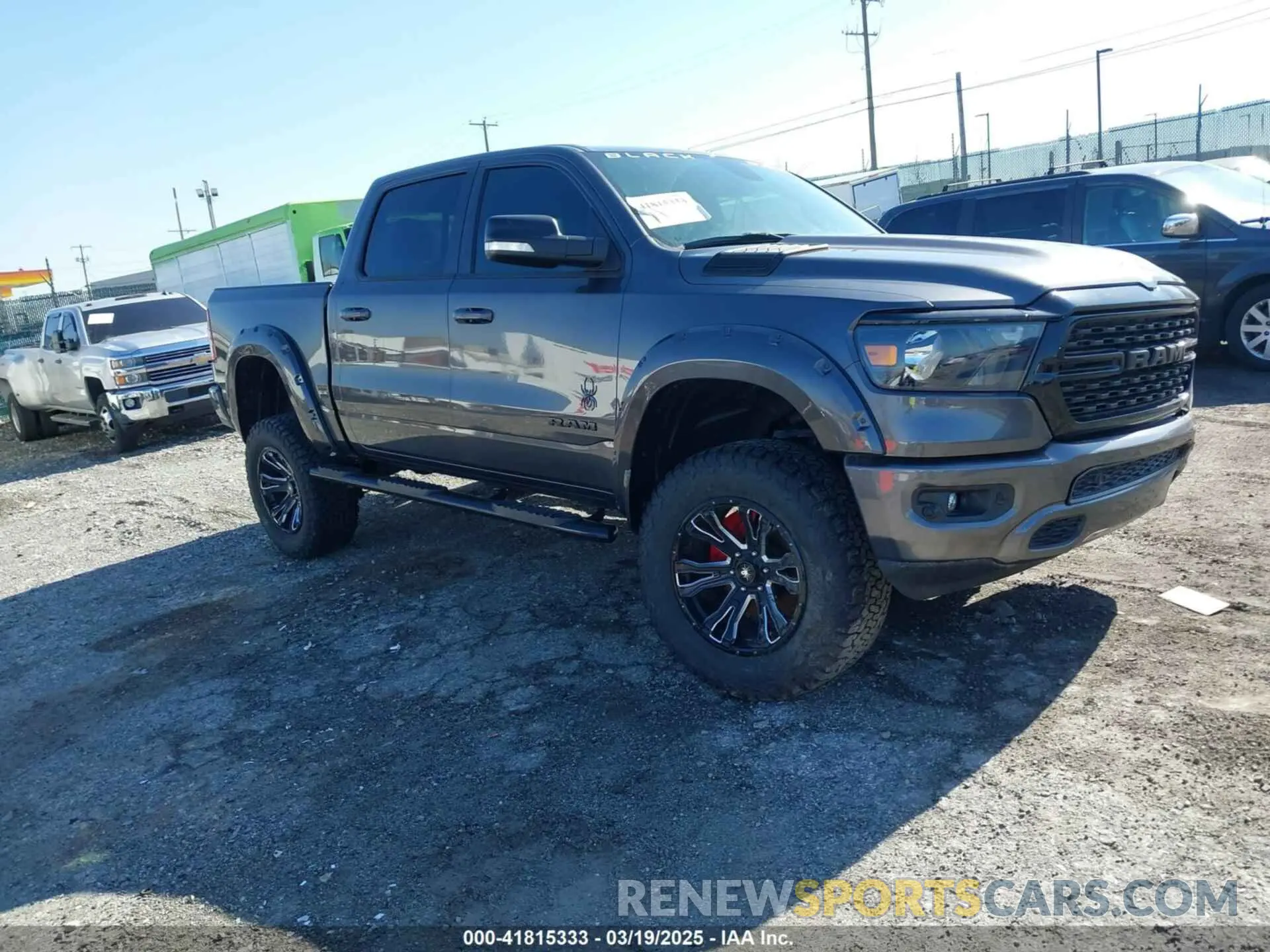 1 Photograph of a damaged car 1C6SRFFTXNN236241 RAM 1500 2022