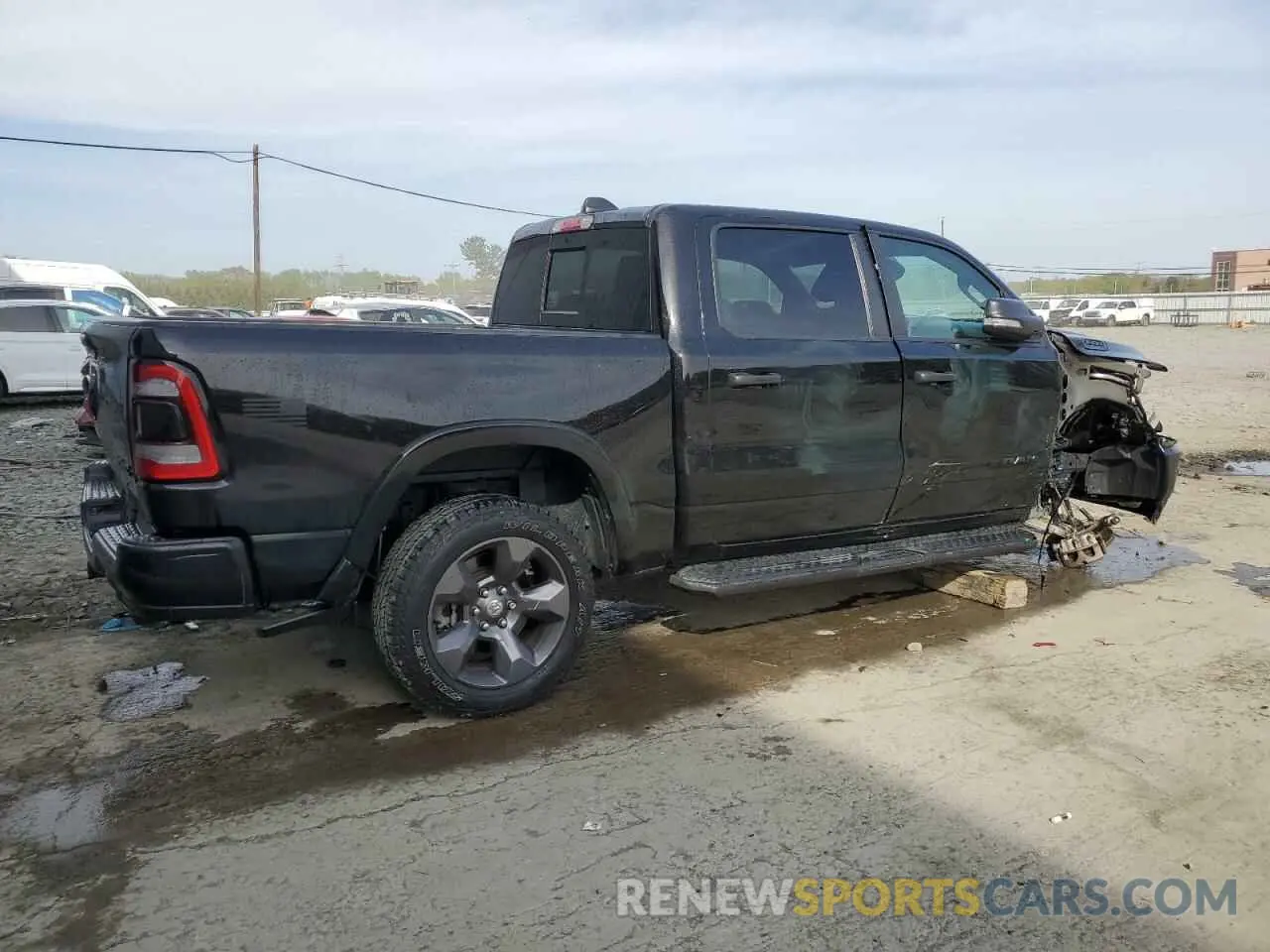 3 Photograph of a damaged car 1C6SRFFTXNN244260 RAM 1500 2022
