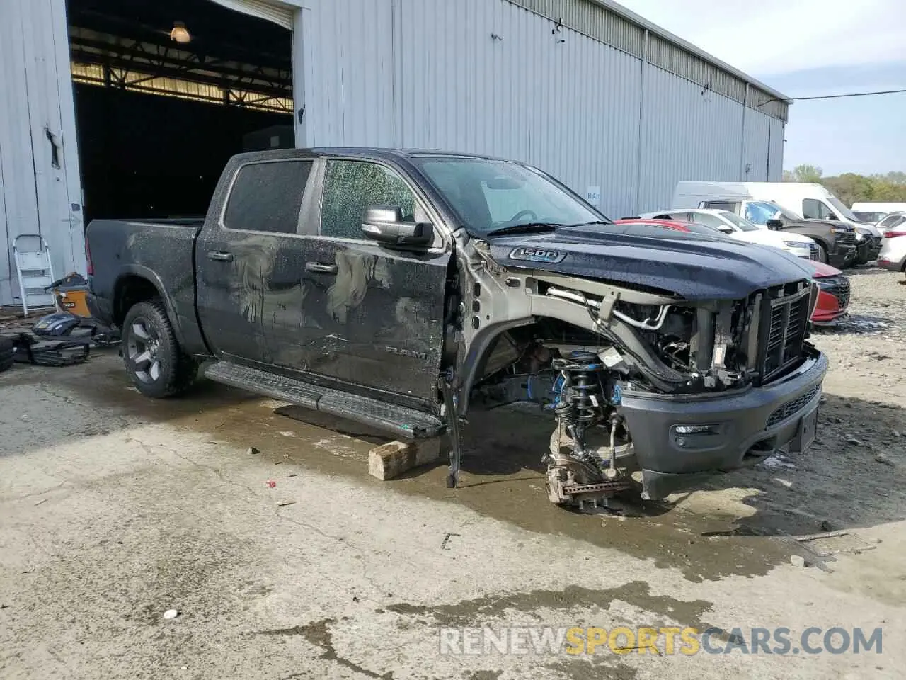 4 Photograph of a damaged car 1C6SRFFTXNN244260 RAM 1500 2022