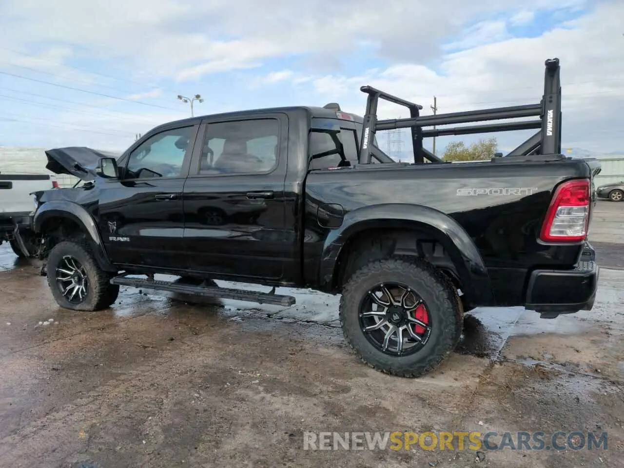 2 Photograph of a damaged car 1C6SRFFTXNN314498 RAM 1500 2022