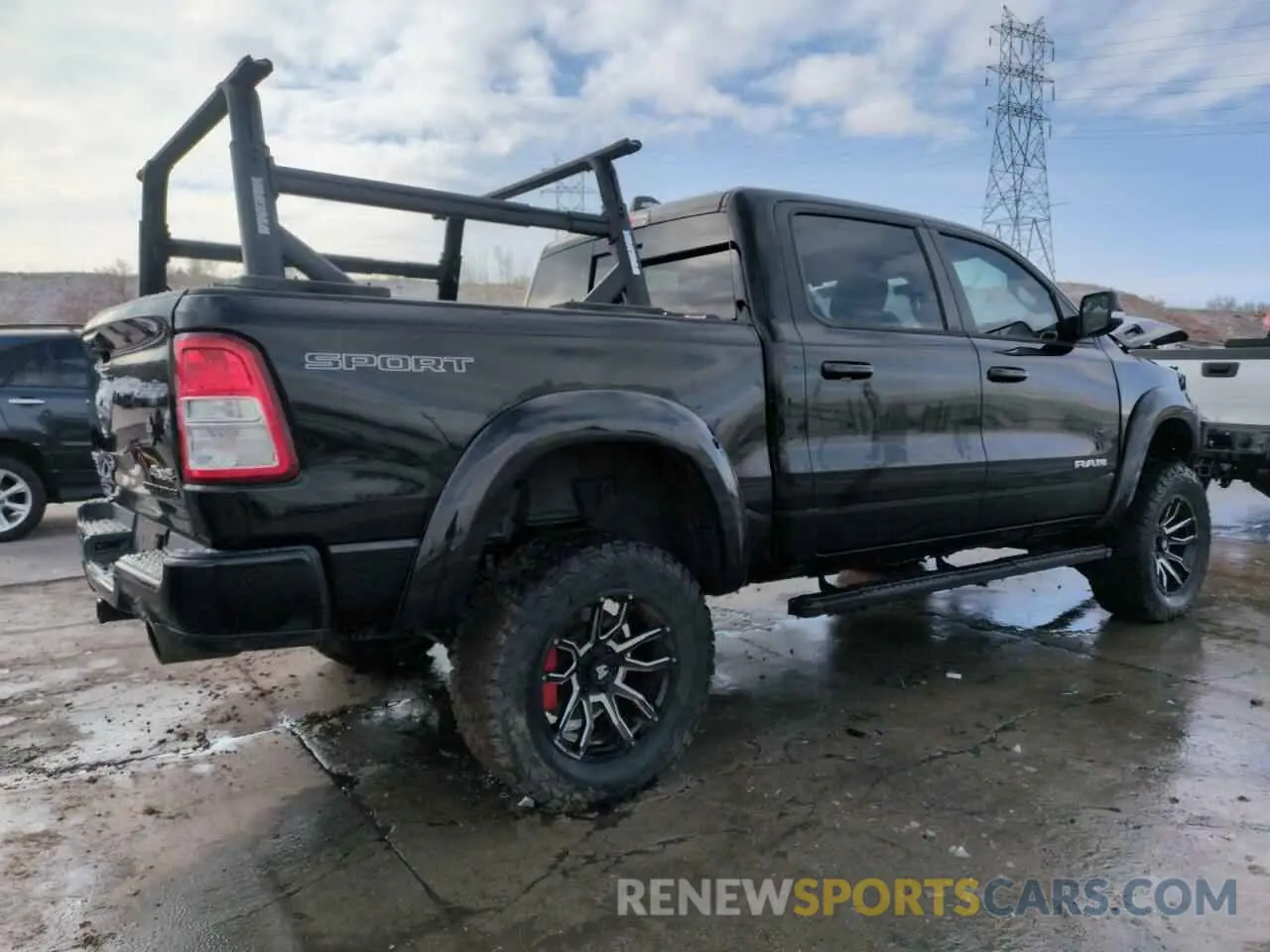 3 Photograph of a damaged car 1C6SRFFTXNN314498 RAM 1500 2022