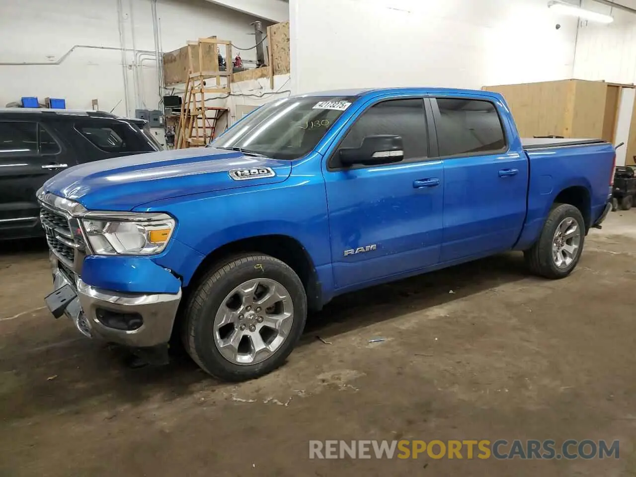 1 Photograph of a damaged car 1C6SRFFTXNN331091 RAM 1500 2022