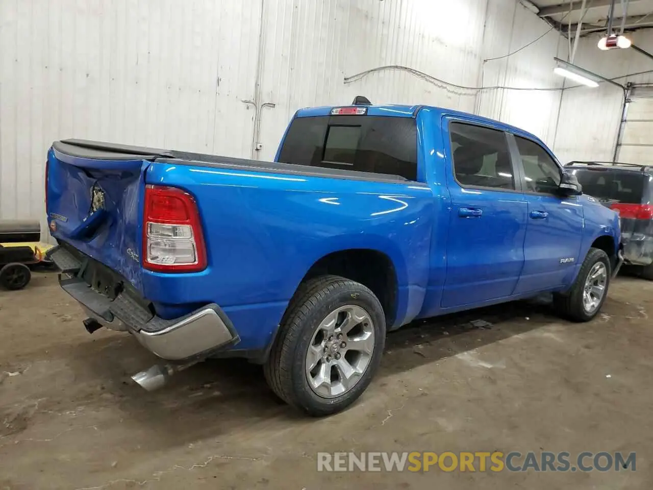 3 Photograph of a damaged car 1C6SRFFTXNN331091 RAM 1500 2022