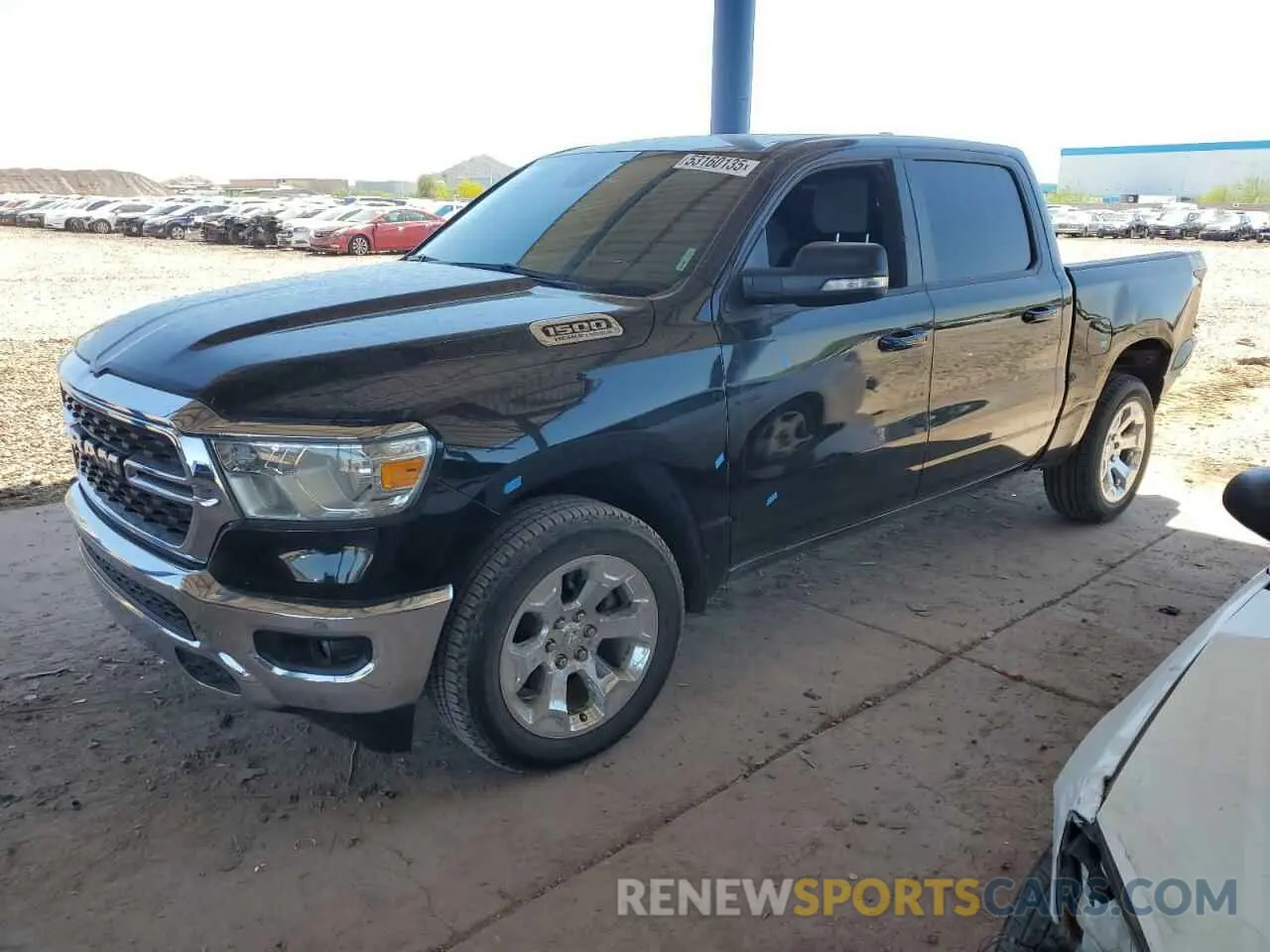 1 Photograph of a damaged car 1C6SRFFTXNN381831 RAM 1500 2022