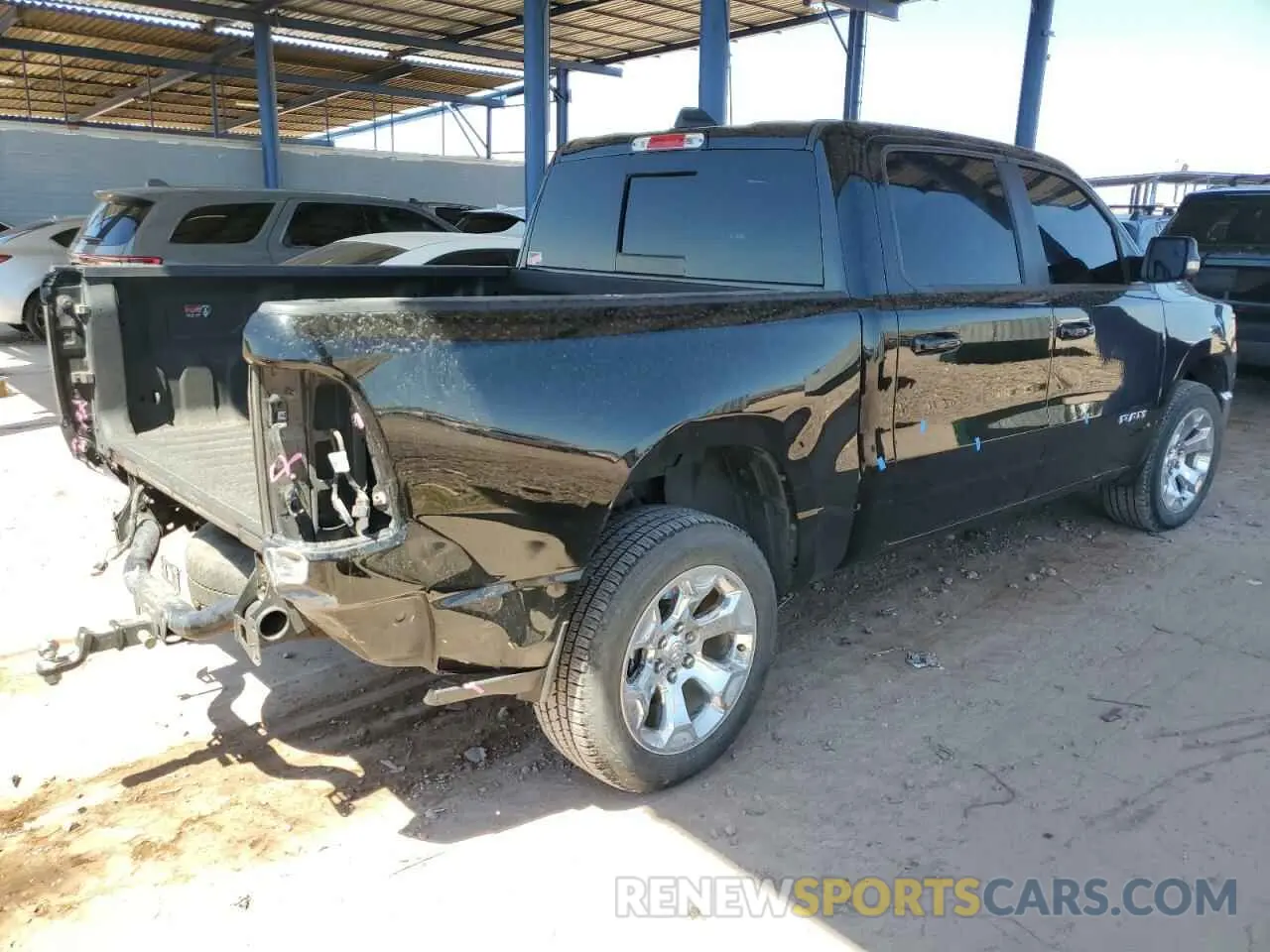 3 Photograph of a damaged car 1C6SRFFTXNN381831 RAM 1500 2022